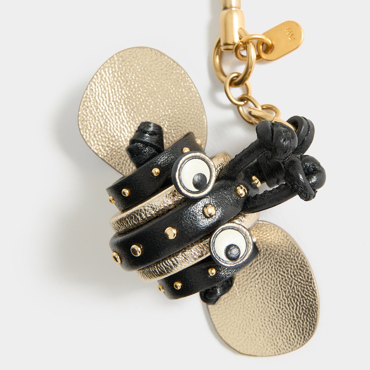 Bee Charm -

          
            Capra Leather in black -
          

          Anya Hindmarch UK
