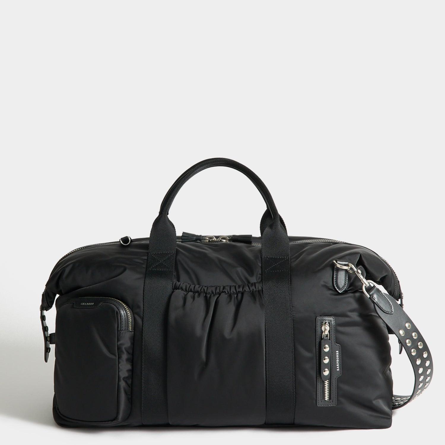 Studs In-Flight Maxi Travel Bag -

          
            Recycled Satin/Calf Leather in Black -
          

          Anya Hindmarch UK
