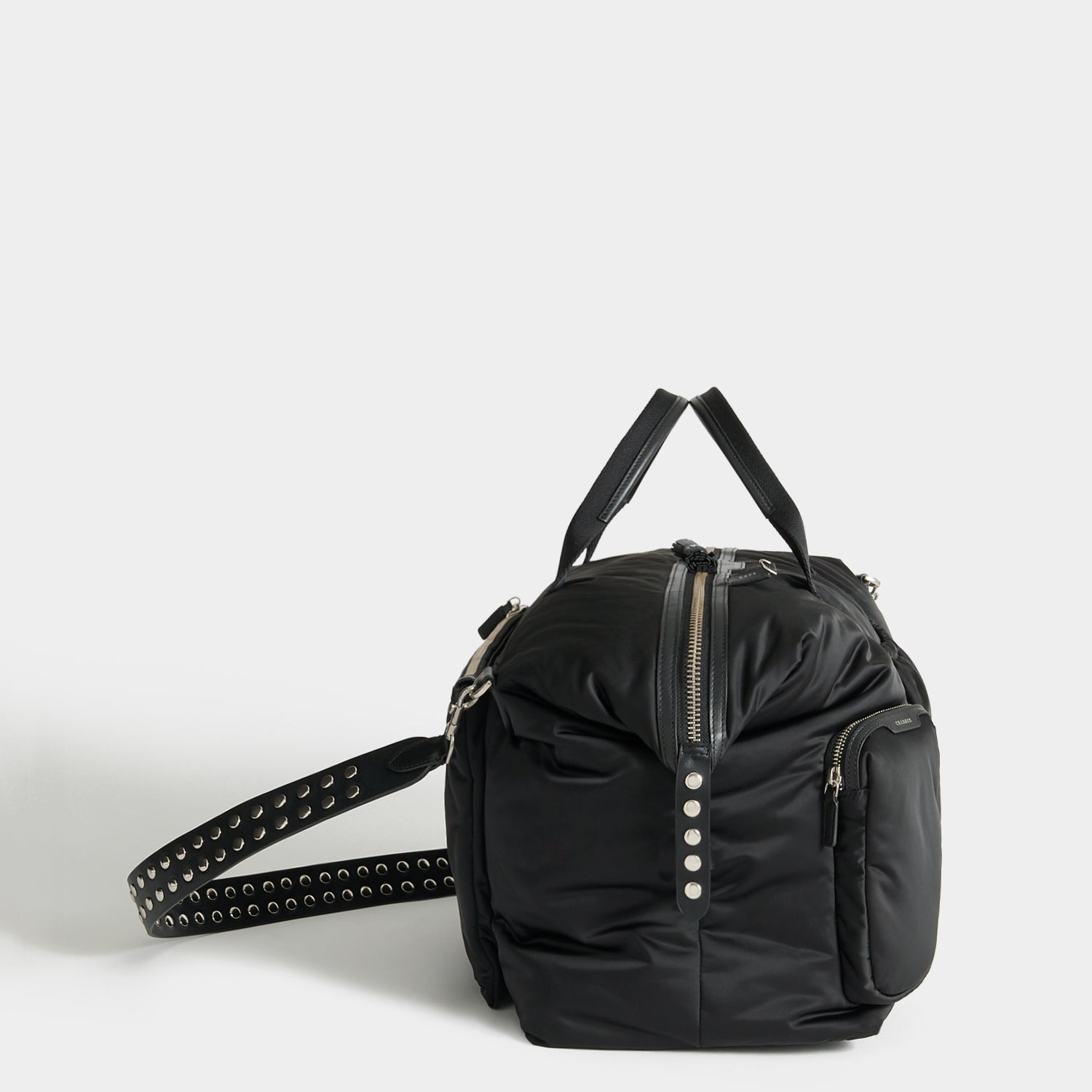 Studs In-Flight Maxi Travel Bag -

          
            Recycled Satin/Calf Leather in Black -
          

          Anya Hindmarch UK
