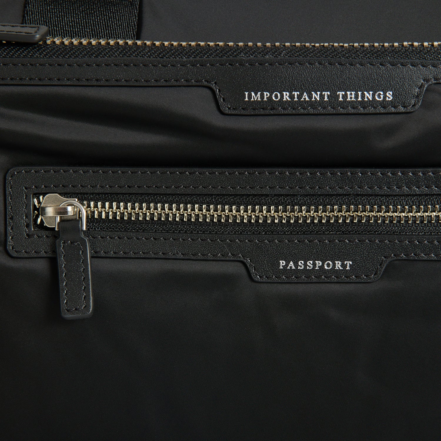 Studs In-Flight Maxi Travel Bag -

          
            Recycled Satin/Calf Leather in Black -
          

          Anya Hindmarch UK
