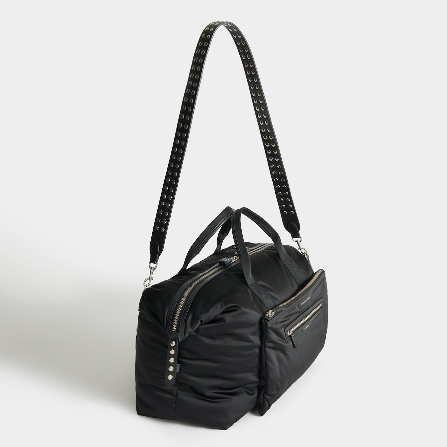 Studs In-Flight Maxi Travel Bag -

          
            Recycled Satin/Calf Leather in Black -
          

          Anya Hindmarch UK
