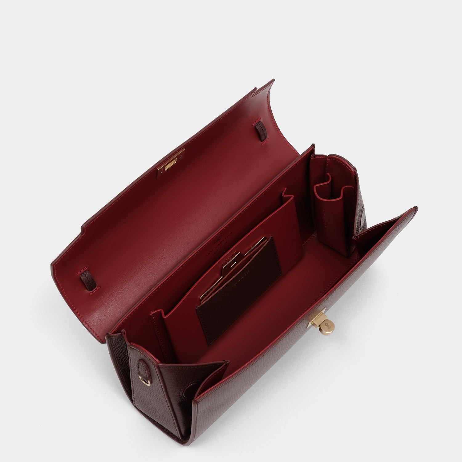 Mortimer Clutch -

          
            Crosshatch Leather in Barolo Red  -
          

          Anya Hindmarch UK
