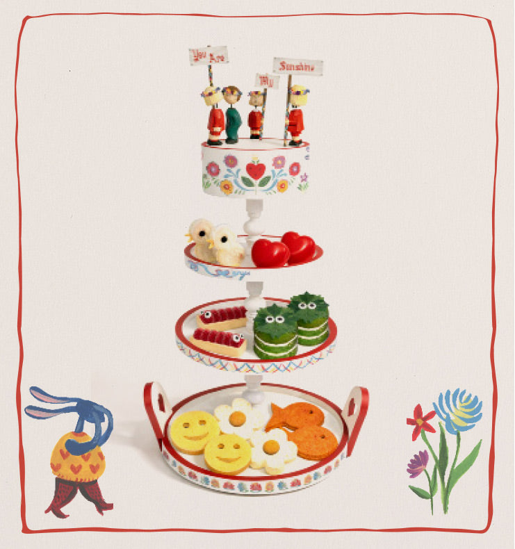 Hand-carved, hand-illustrated three-tier afternoon tea stands for Anya Hindmarch