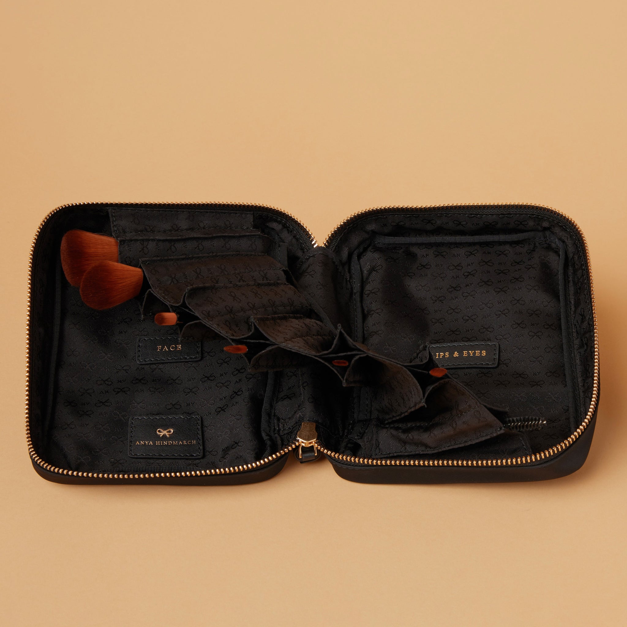 Make-Up Folio -

                  
                    Regenerated ECONYL® in Black -
                  

                  Anya Hindmarch UK
