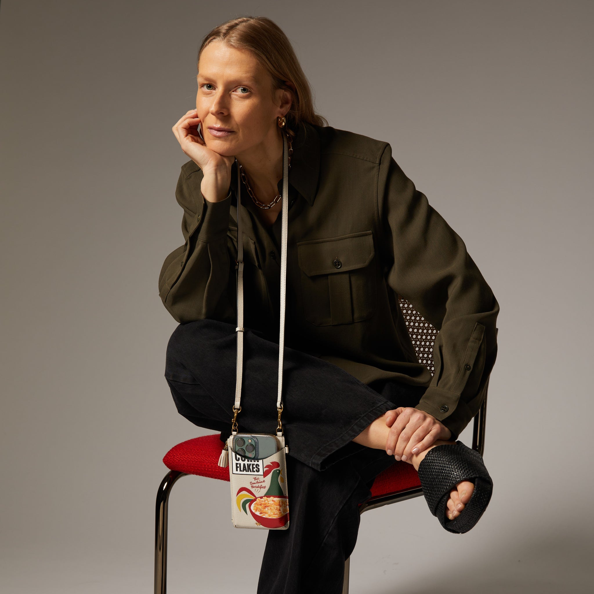 Anya Brands Corn flakes Zip Phone Pouch on Strap -

                  
                    Shiny Capra Leather in Chalk -
                  

                  Anya Hindmarch UK
