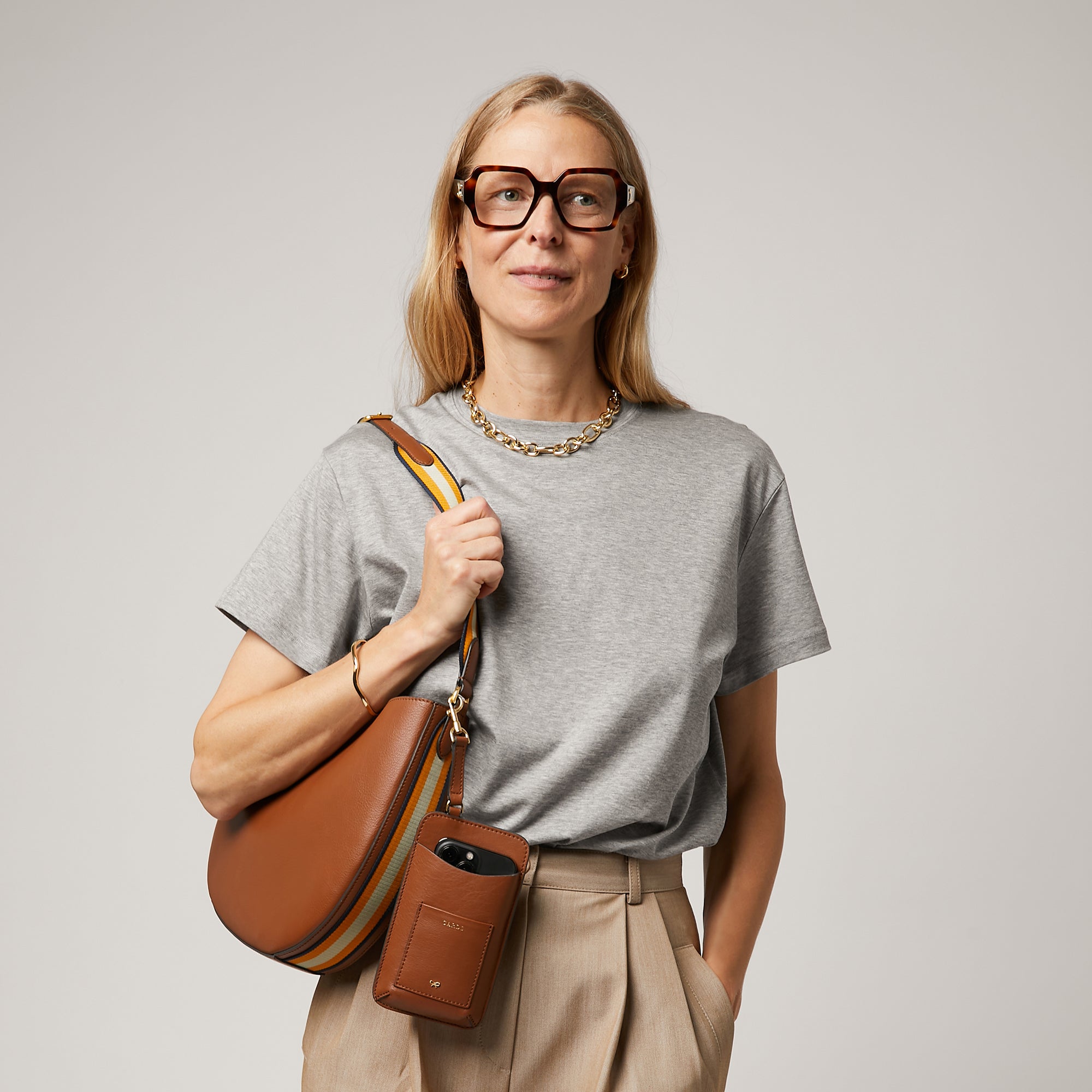 Nastro Small Hobo Bag -

                  
                    Flat Leather in Cedar -
                  

                  Anya Hindmarch UK
