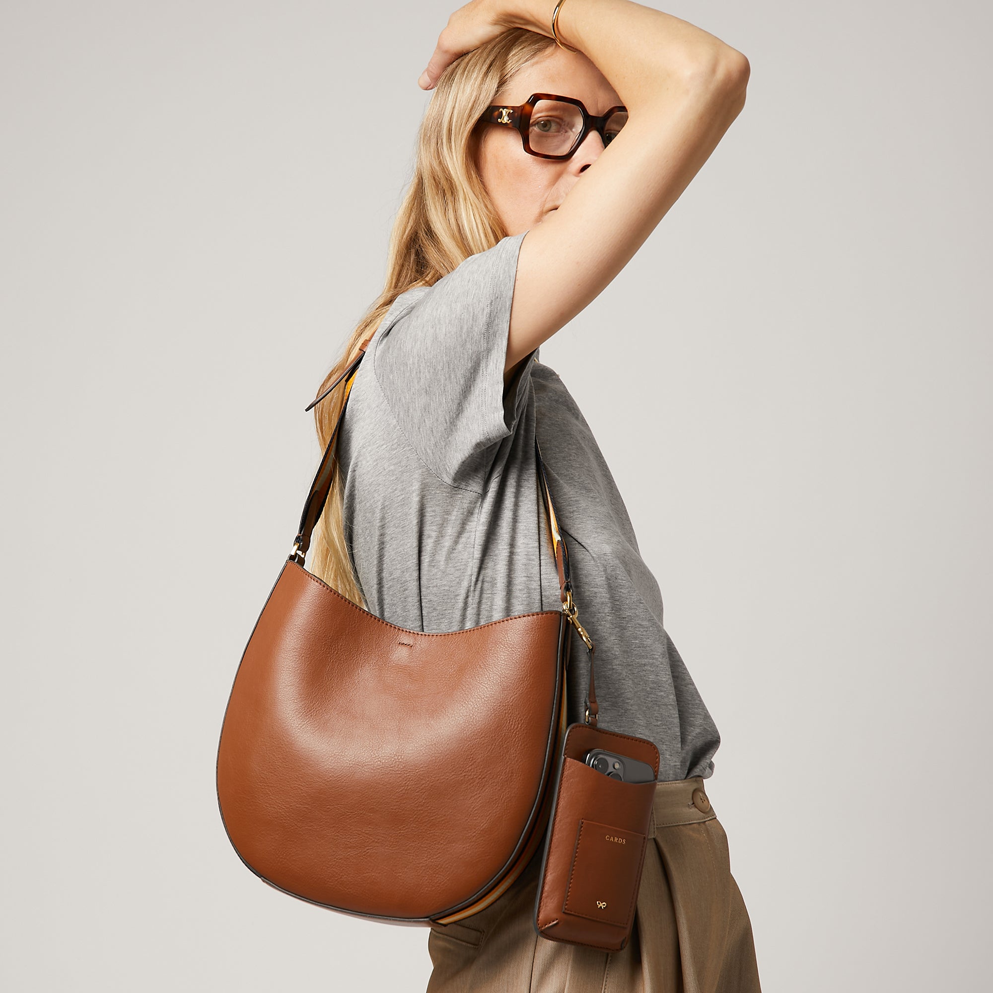 Nastro Small Hobo -

                  
                    Flat leather in Cedar -
                  

                  Anya Hindmarch UK
