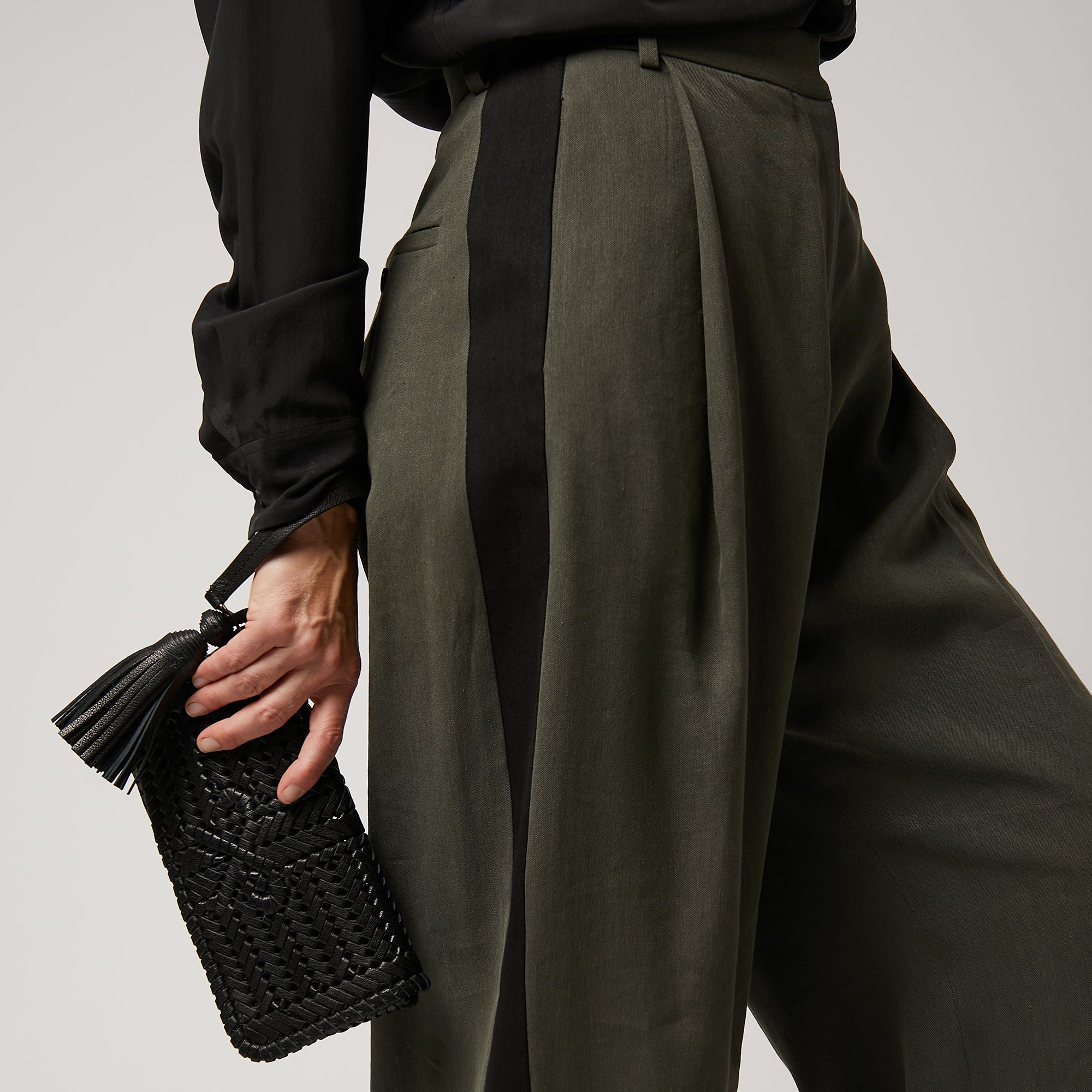 Neeson Tassel Clutch -

                  
                    Capra Leather in Black -
                  

                  Anya Hindmarch UK
