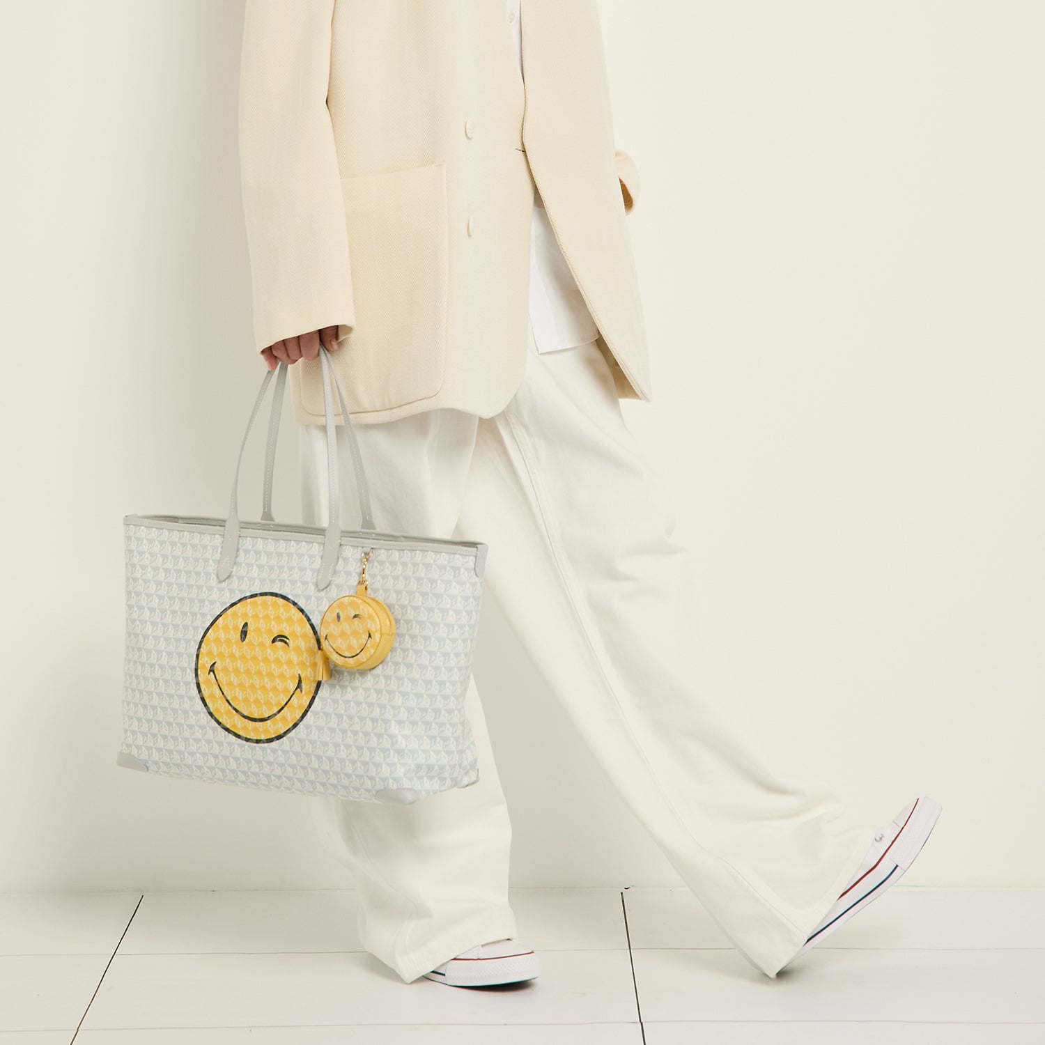 I Am A Plastic Bag Wink Zipped Tote -

                  
                    Recycled Canvas in Frost -
                  

                  Anya Hindmarch UK
