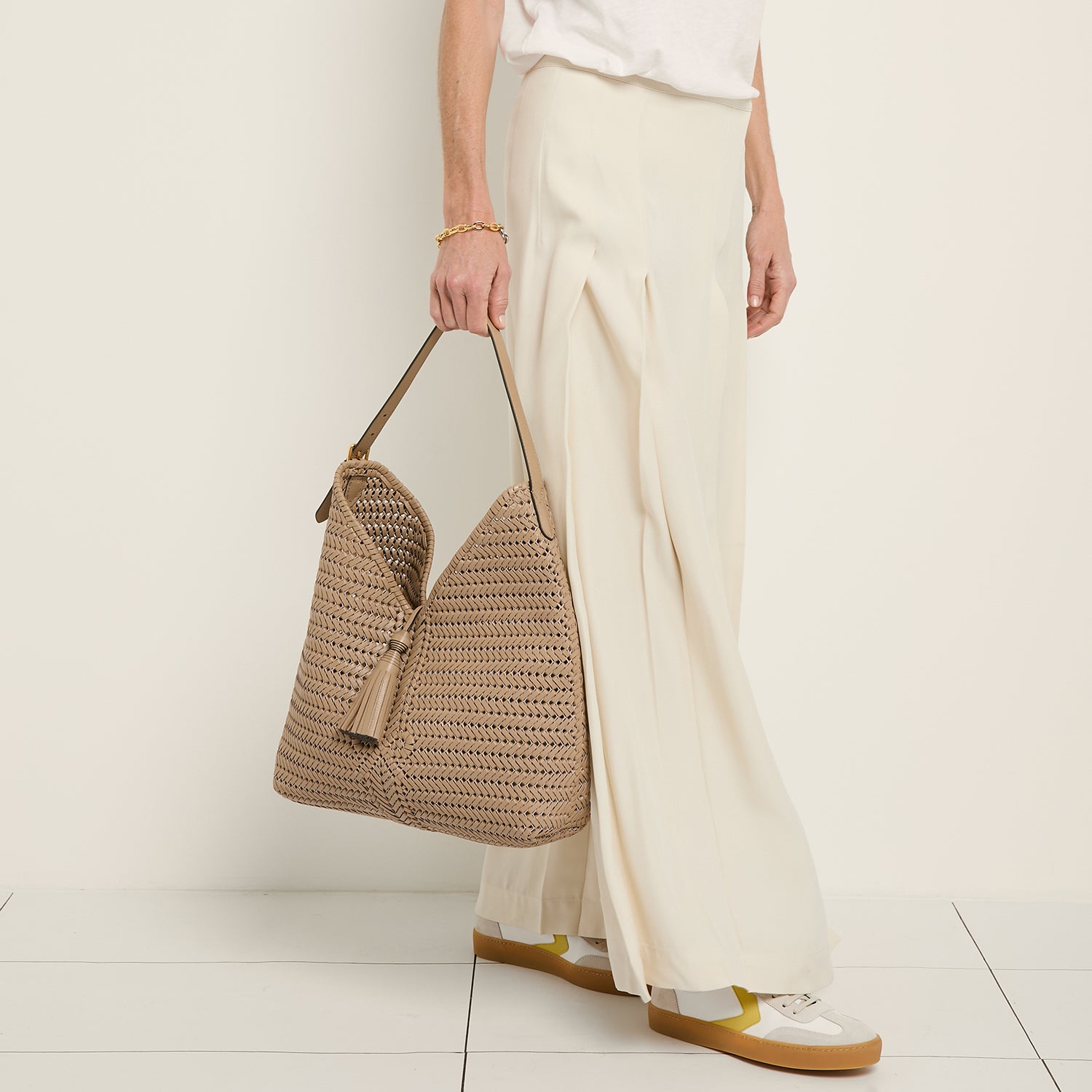 Neeson Tassel Hobo Bag -

                  
                    Capra Leather in Sand -
                  

                  Anya Hindmarch UK
