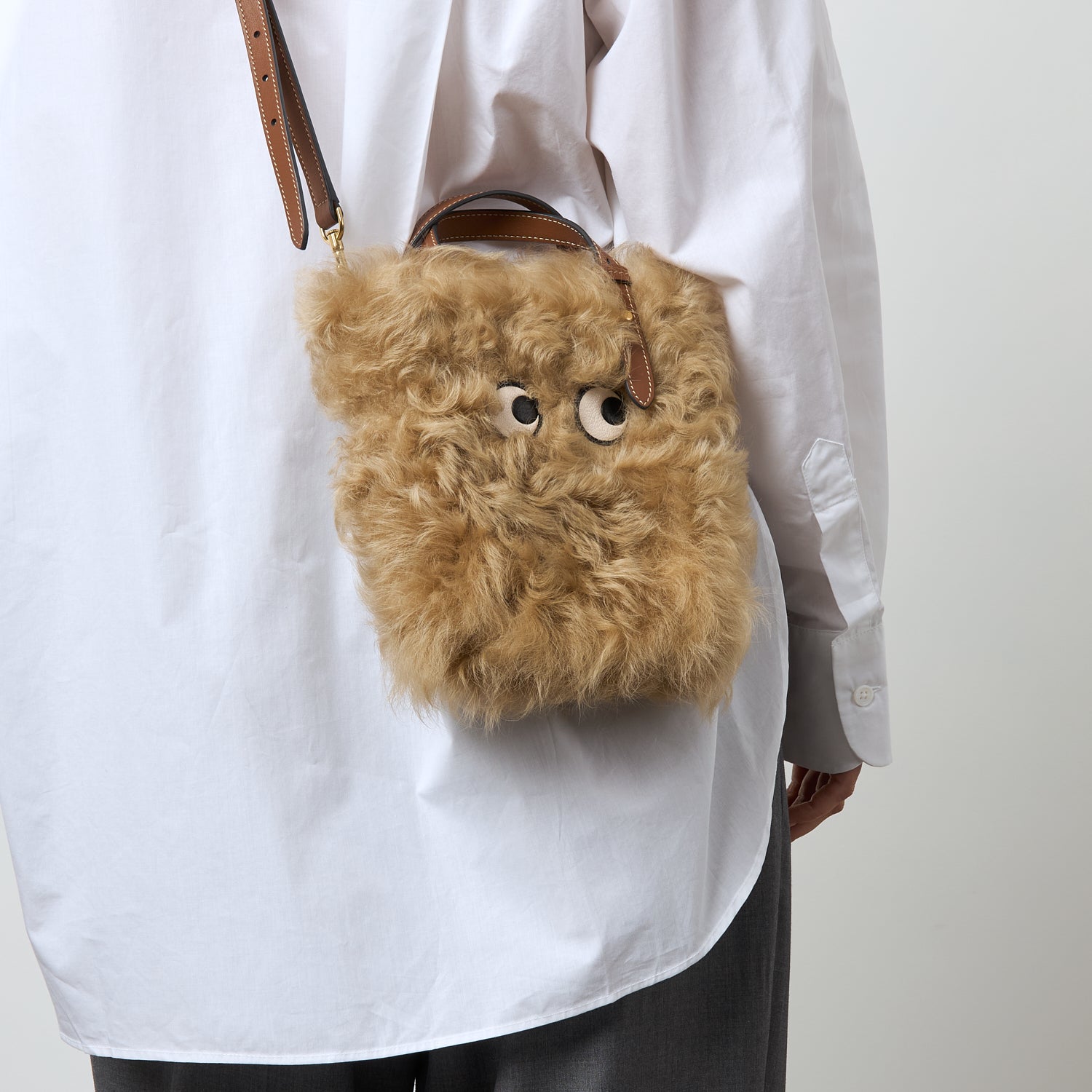 N/S Mini Eyes Shearling Tote -

          
            Shearling/Smooth Leather in Taupe -
          

          Anya Hindmarch UK
