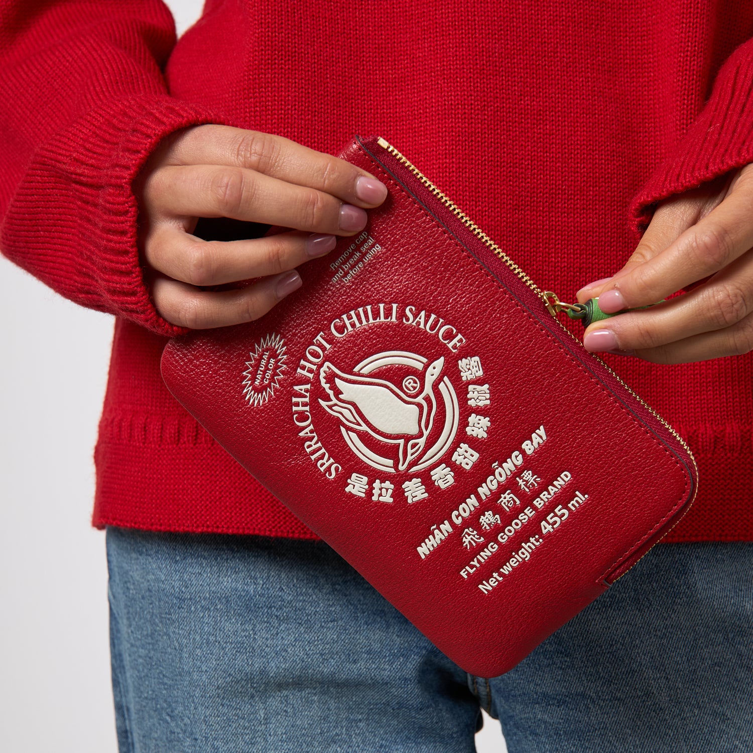 Anya Brands Flying Goose Sriracha Zip Loose Pocket -

          
            Smooth Leather in Russet Red -
          

          Anya Hindmarch UK
