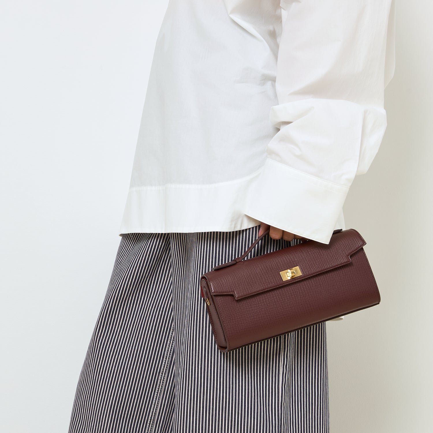 Mortimer Clutch -

          
            Crosshatch Leather in Barolo Red  -
          

          Anya Hindmarch UK
