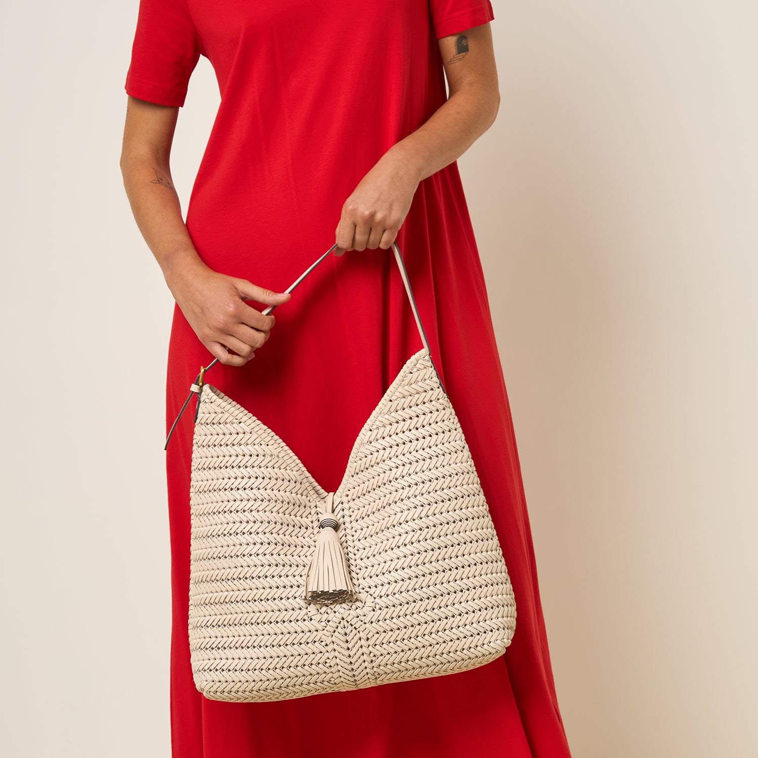 Neeson Tassel Hobo Bag -

          
            Capra Leather in Chalk -
          

          Anya Hindmarch UK
