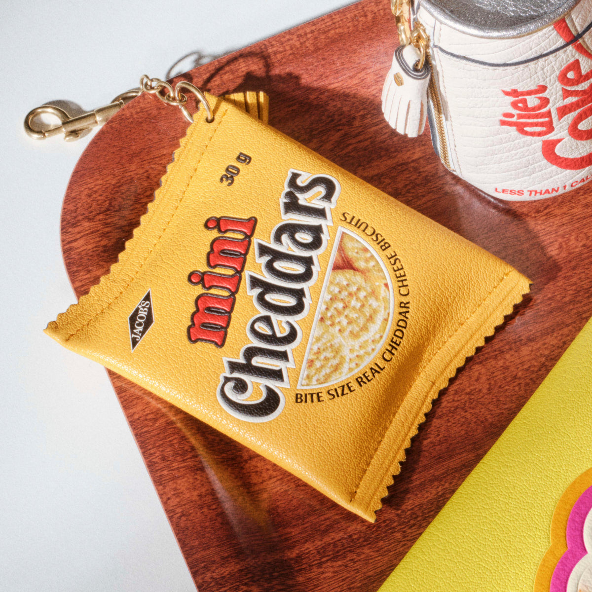 Anya Brands Jacob's Mini Cheddars Earphone Case Charm -

          
            Calf Leather in Lemon Curd Yellow -
          

          Anya Hindmarch UK
