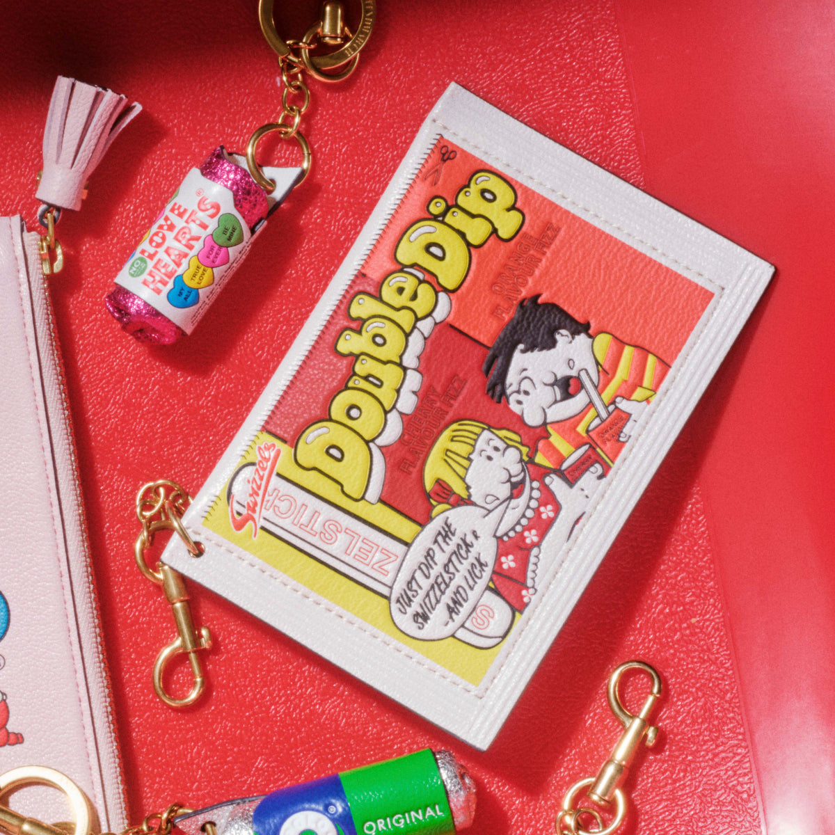 Anya Brands Double Dip Charm Earphone Case -

          
            Calf Leather in Optic White -
          

          Anya Hindmarch UK
