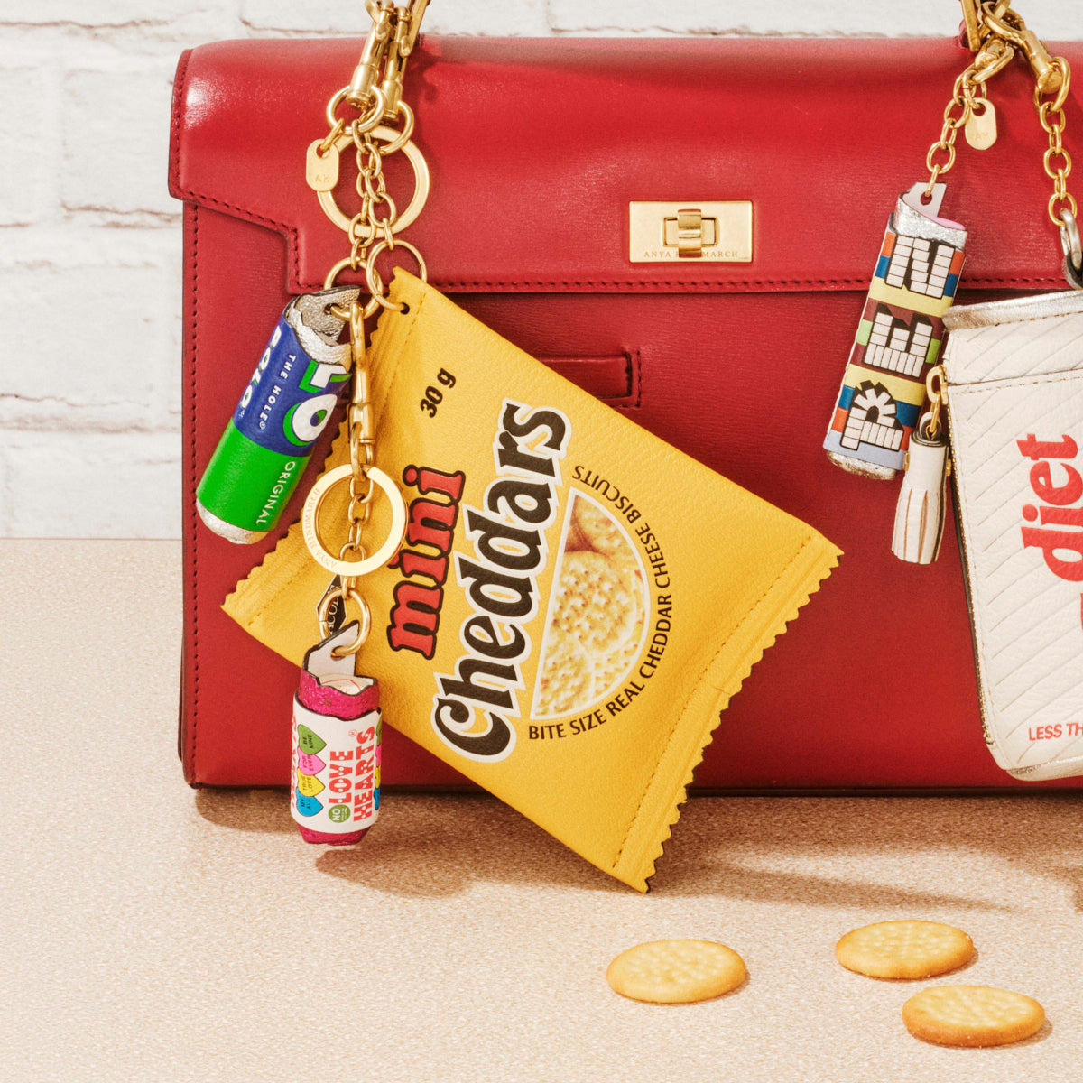 Anya Brands Jacob's Mini Cheddars Earphone Case Charm -

          
            Calf Leather in Lemon Curd Yellow -
          

          Anya Hindmarch UK
