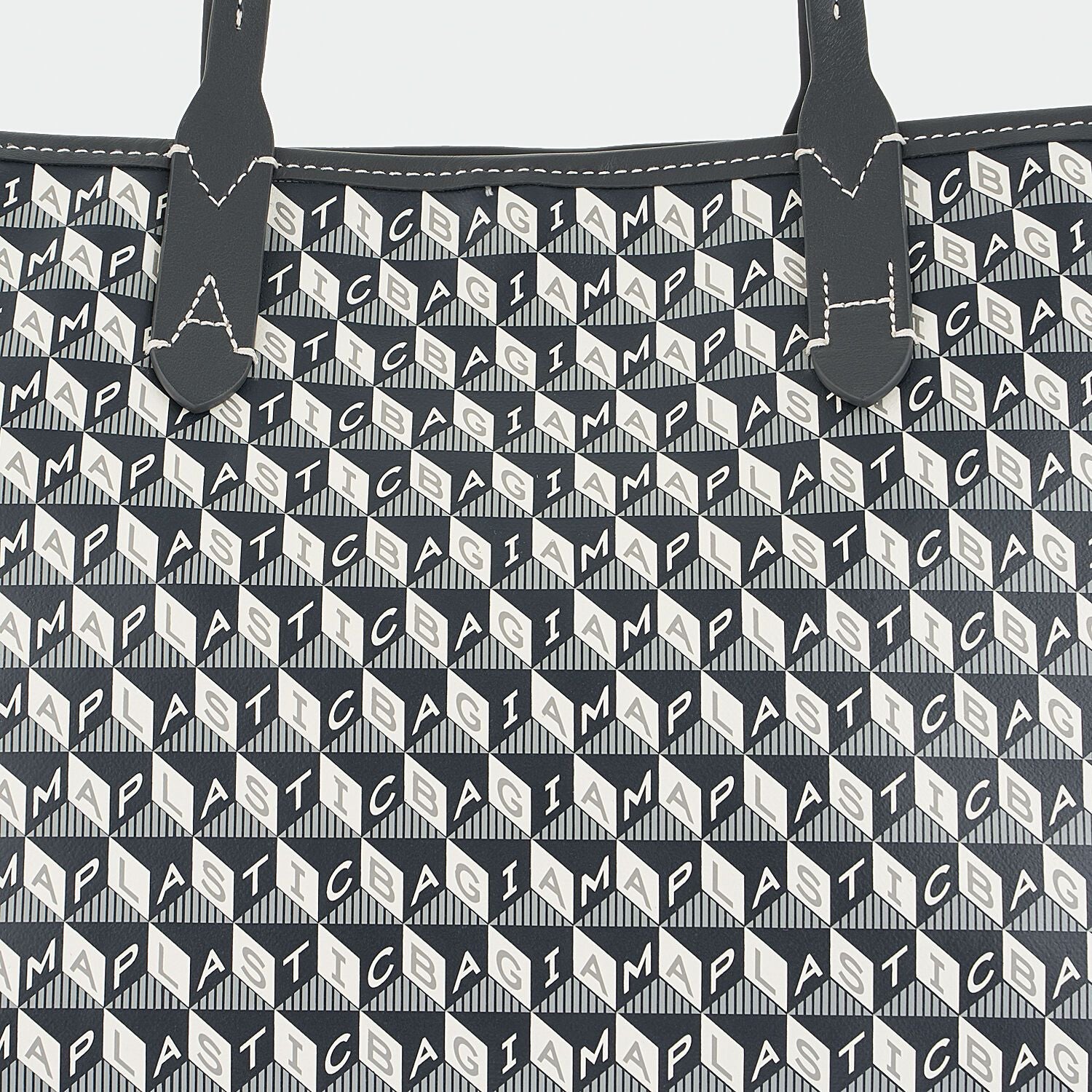 I Am A Plastic Bag Small Tote -

                  
                    Recycled Coated Canvas in Charcoal -
                  

                  Anya Hindmarch UK
