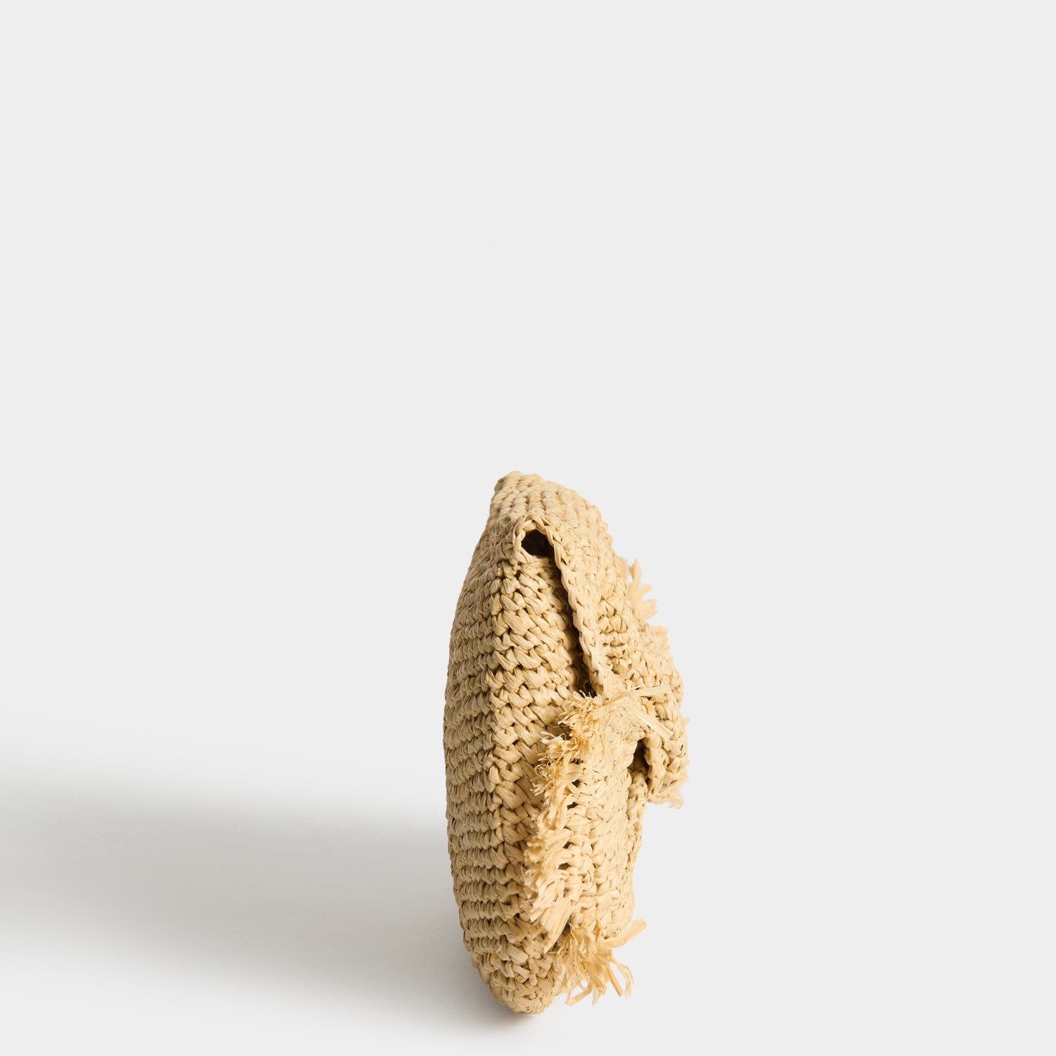 Raffia Bow Clutch -

          
            Raffia in Natural -
          

          Anya Hindmarch UK
