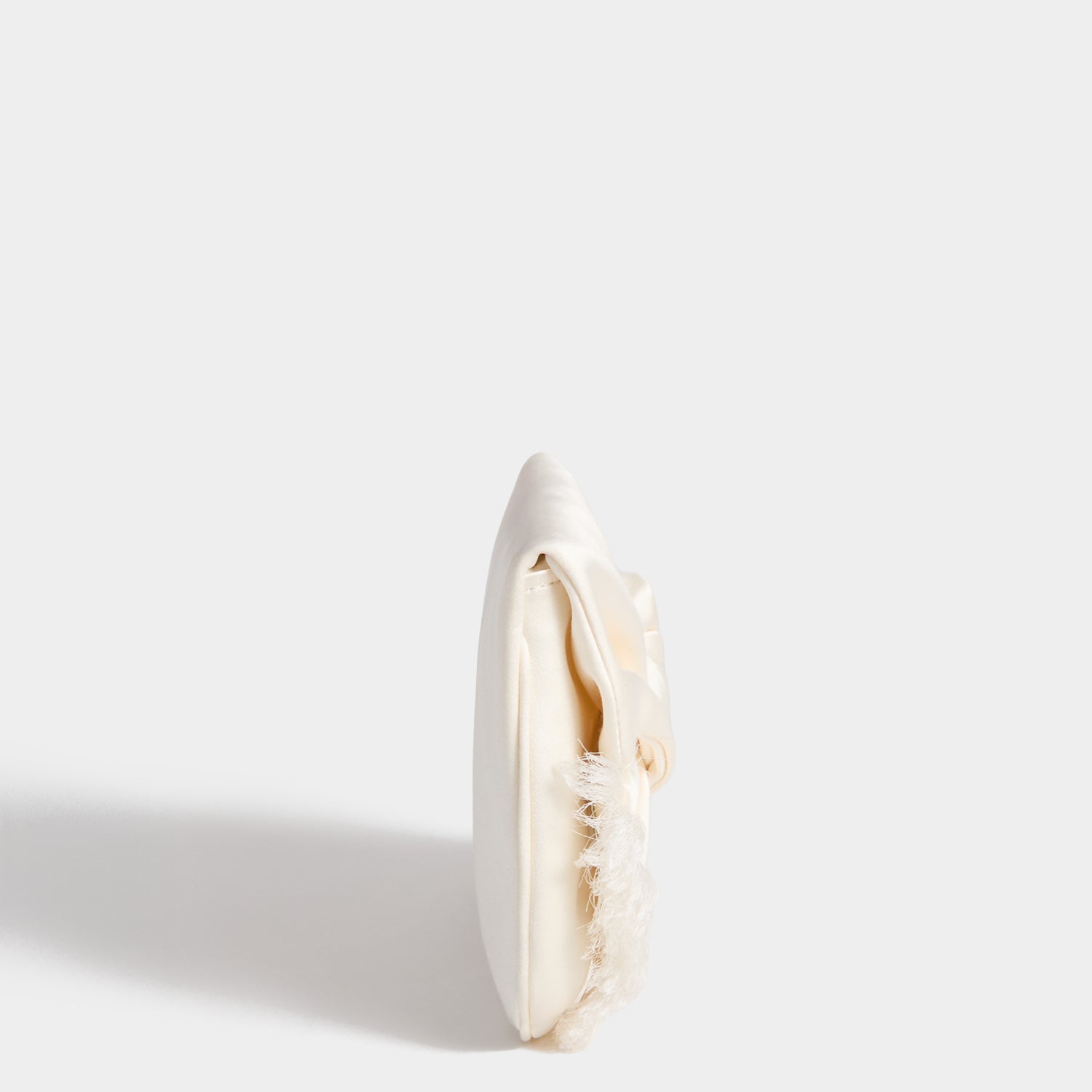 Bow Clutch -

          
            Double Satin in Ivory -
          

          Anya Hindmarch UK
