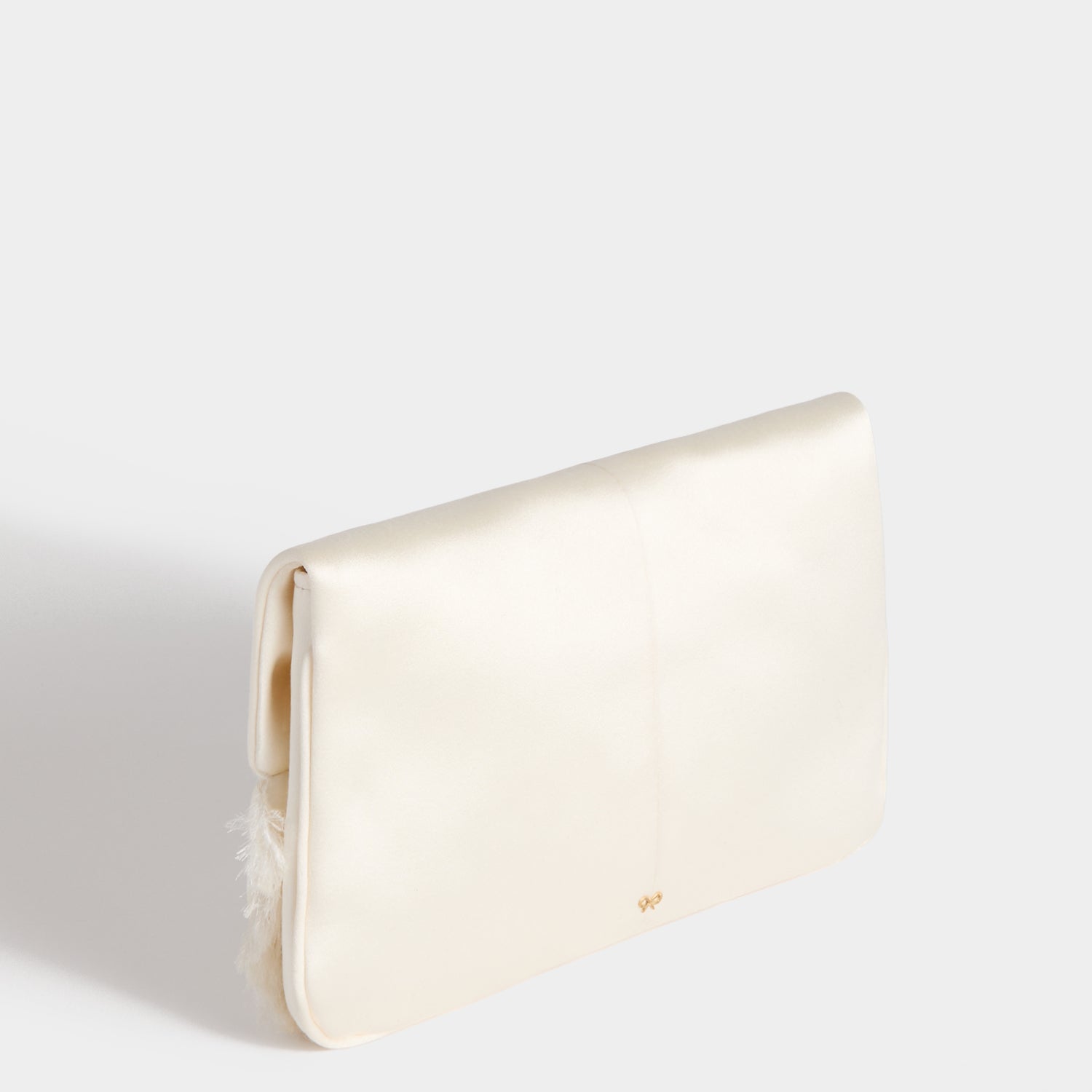 Bow Clutch -

          
            Double Satin in Ivory -
          

          Anya Hindmarch UK
