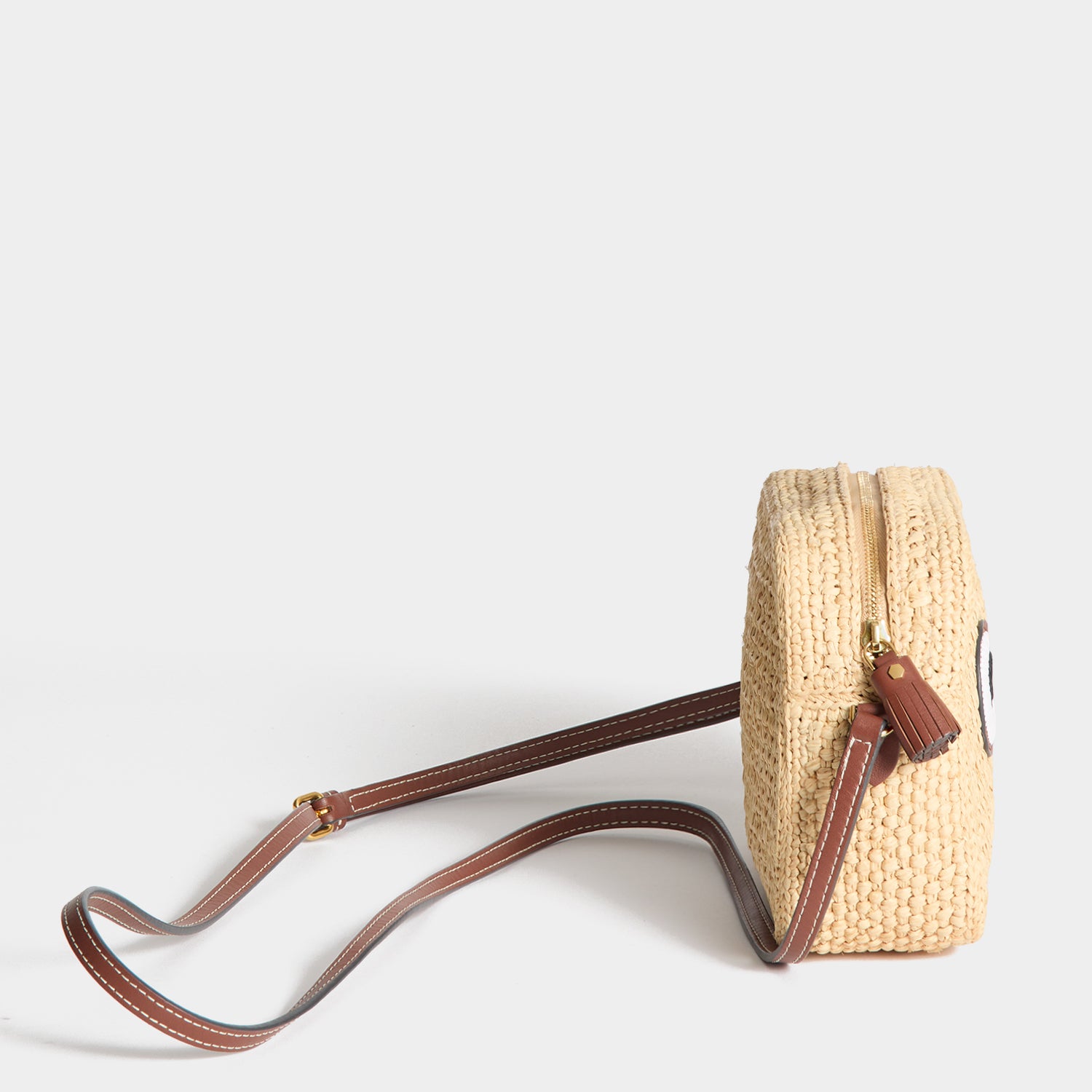 Raffia Eyes Cross-body -

          
            Raffia in Natural -
          

          Anya Hindmarch UK
