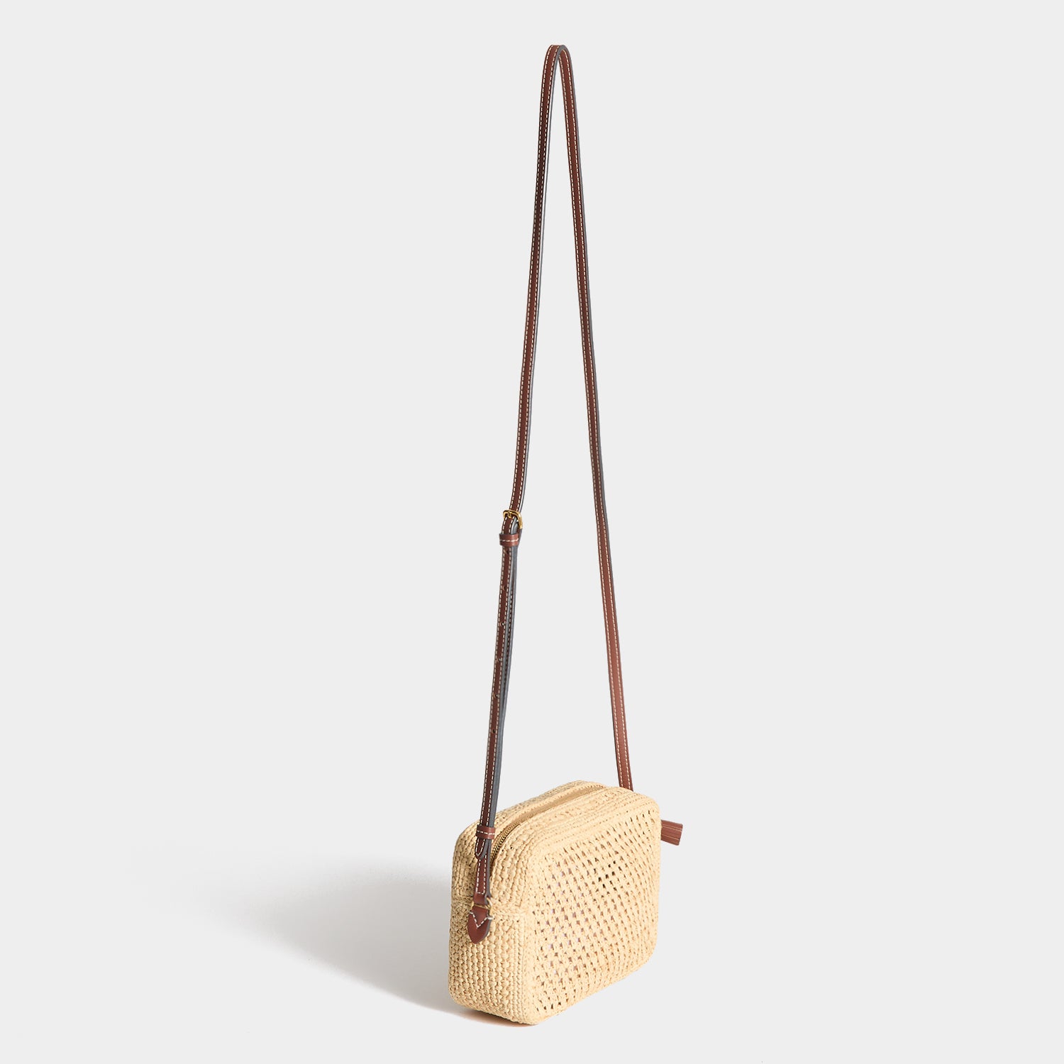 Raffia Eyes Cross-body -

          
            Raffia in Natural -
          

          Anya Hindmarch UK
