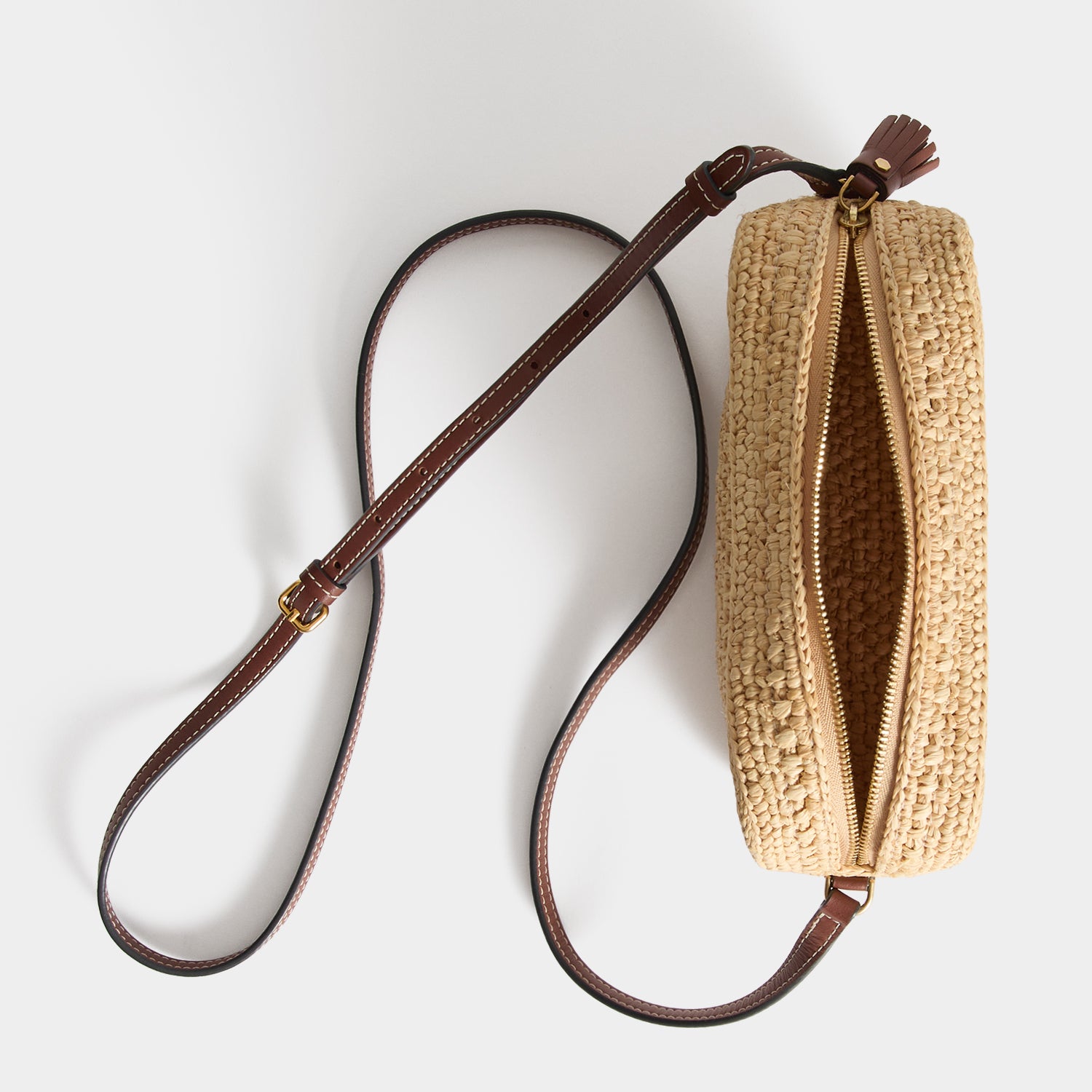 Raffia Eyes Cross-body -

          
            Raffia in Natural -
          

          Anya Hindmarch UK
