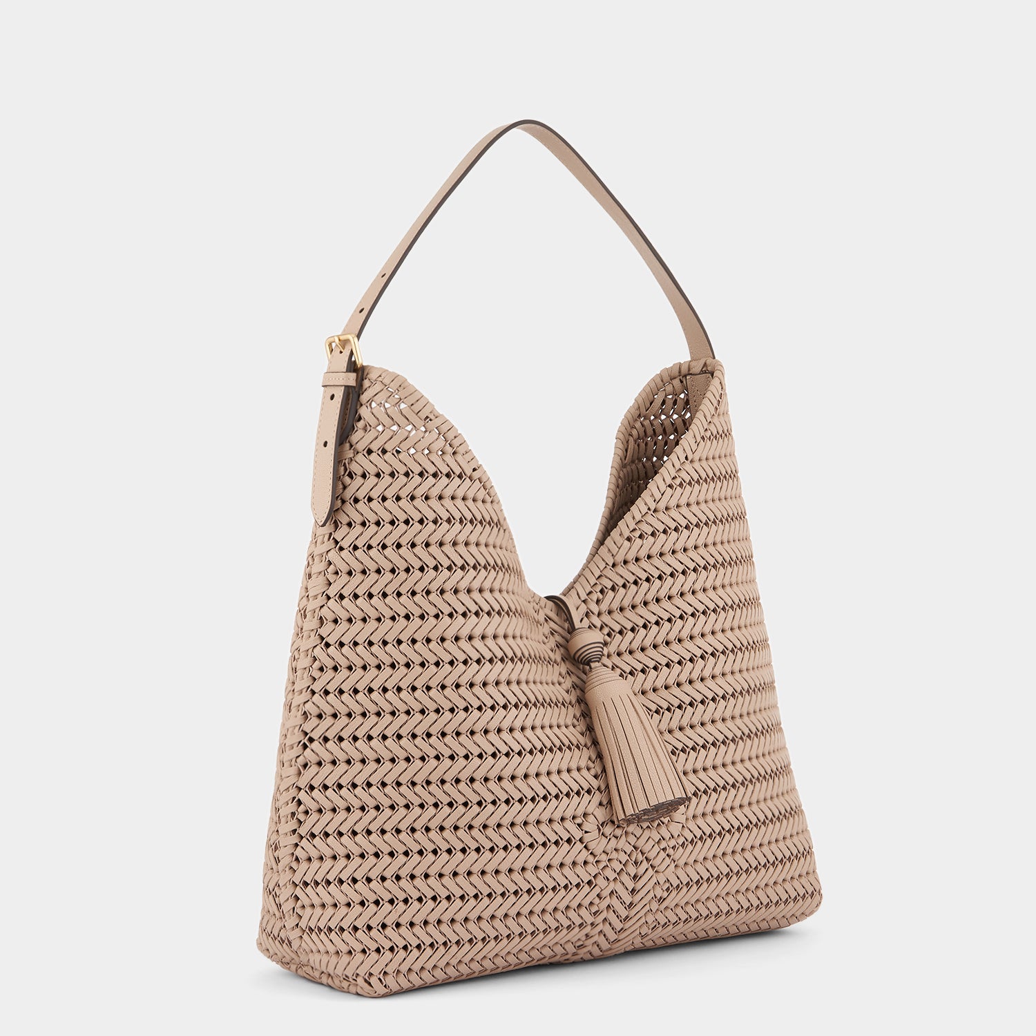 The Neeson Tassel Hobo -

                  
                    Capra Leather in Light Nude -
                  

                  Anya Hindmarch UK
