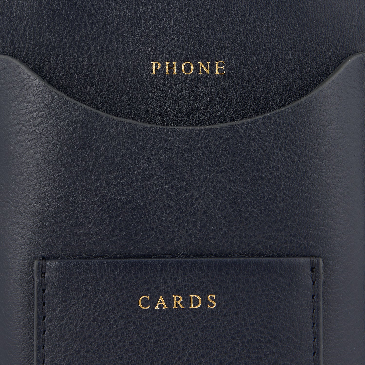 Nastro Phone Pouch On Strap -

                  
                    Leather in marine -
                  

                  Anya Hindmarch UK
