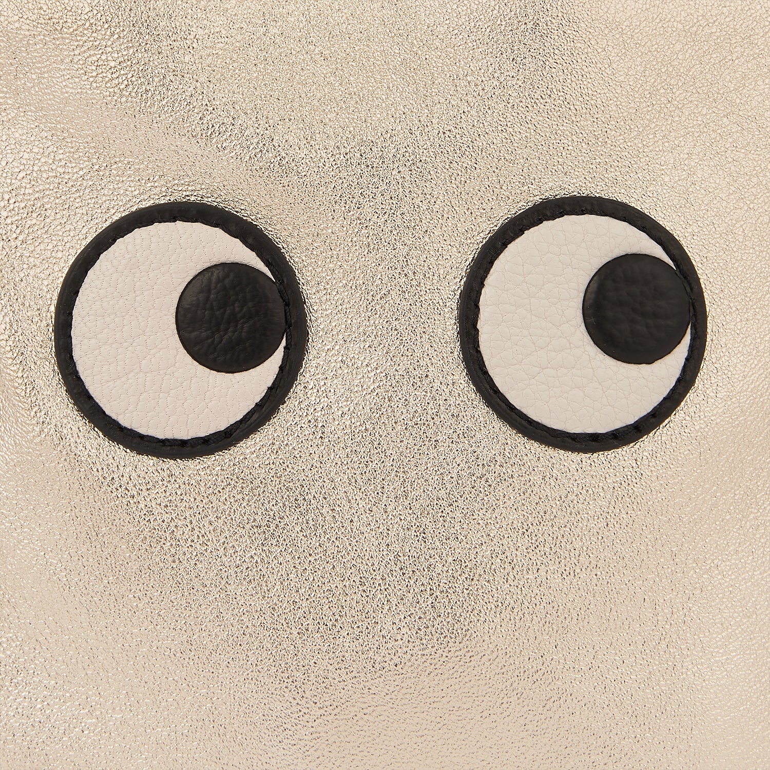 Eyes Drawstring Pouch -

                  
                    Metallic Leather in Light Gold -
                  

                  Anya Hindmarch UK
