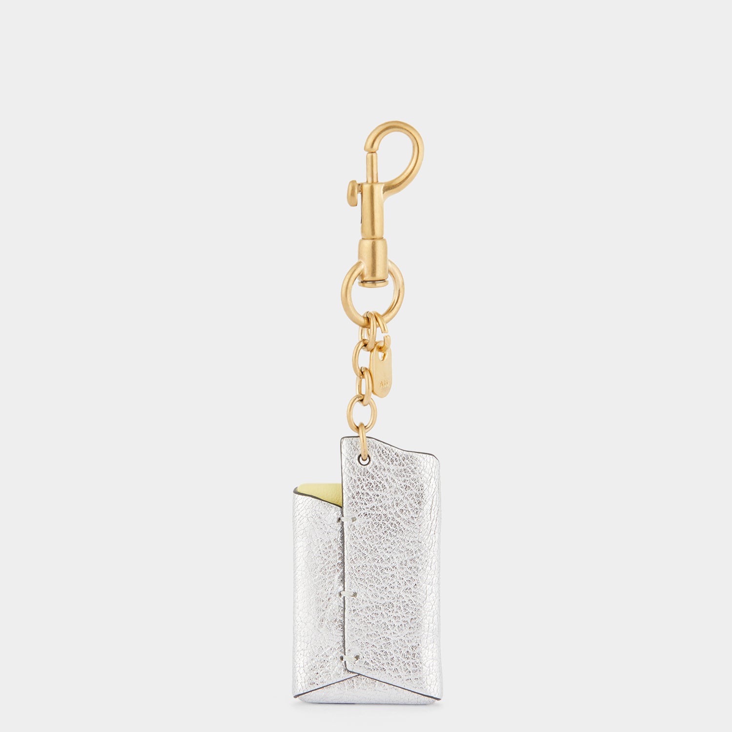 Anya Brands Lurpak Charm -

                  
                    Capra Leather in Silver -
                  

                  Anya Hindmarch UK
