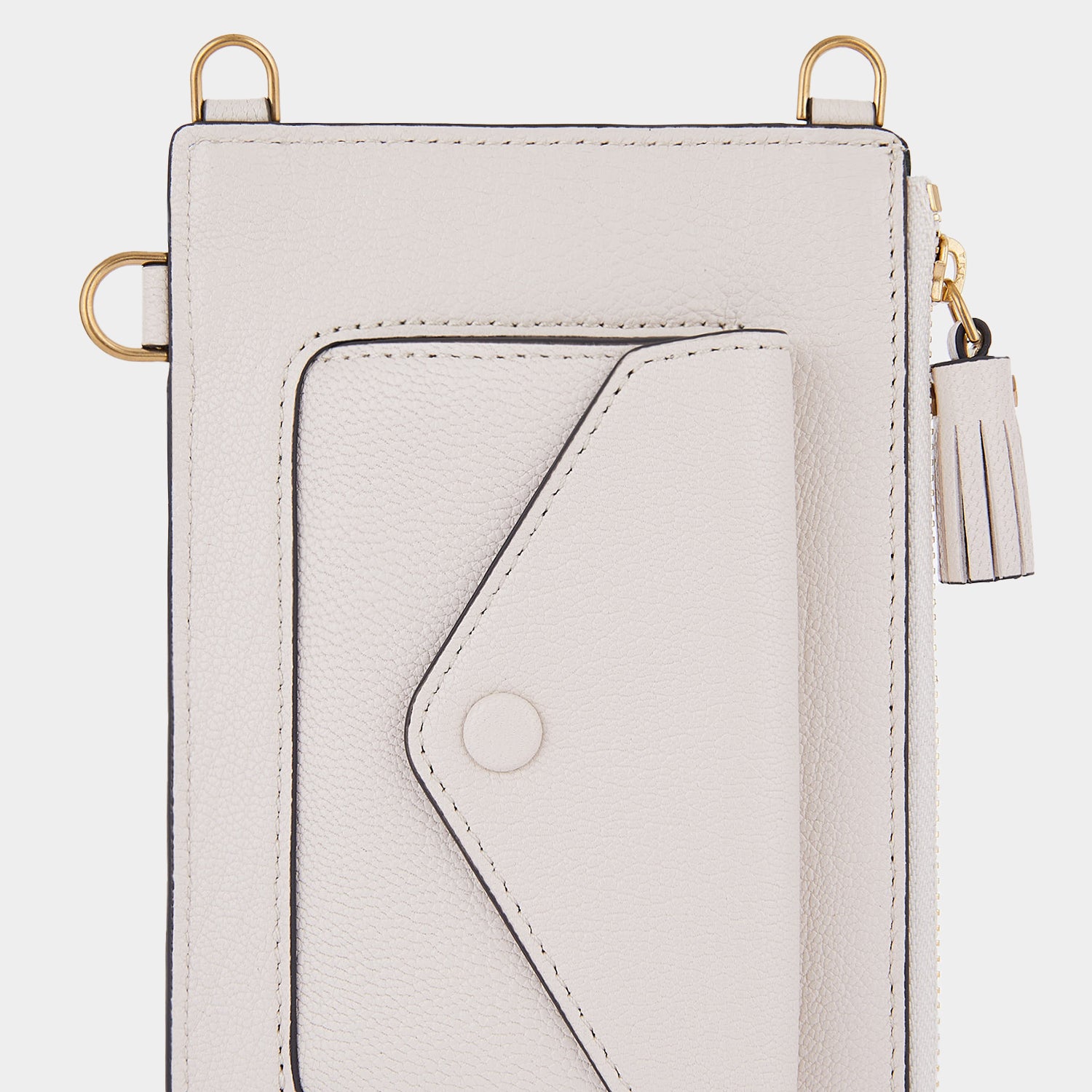 Anya Brands Corn Flakes Zip Phone Pouch on Strap -

                  
                    Shiny Capra Leather in Chalk -
                  

                  Anya Hindmarch UK
