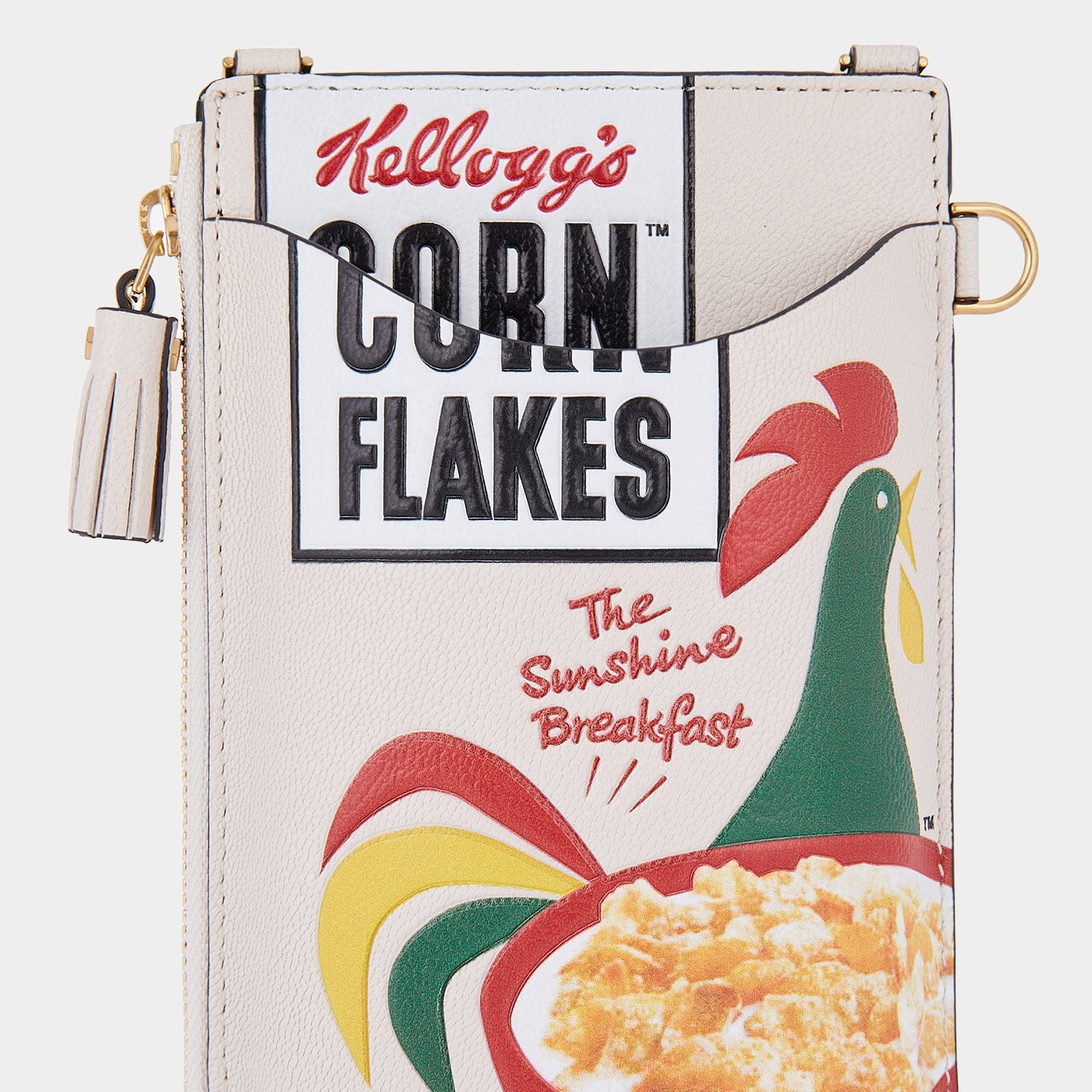 Anya Brands Corn Flakes Zip Phone Pouch on Strap -

                  
                    Shiny Capra Leather in Chalk -
                  

                  Anya Hindmarch UK

