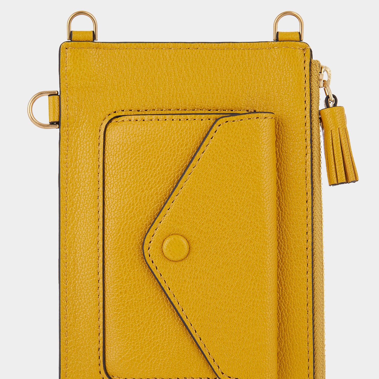 Anya Brands Coco Pops Zip Phone Pouch on Strap -

                  
                    Shiny Capra Leather in Mustard -
                  

                  Anya Hindmarch UK
