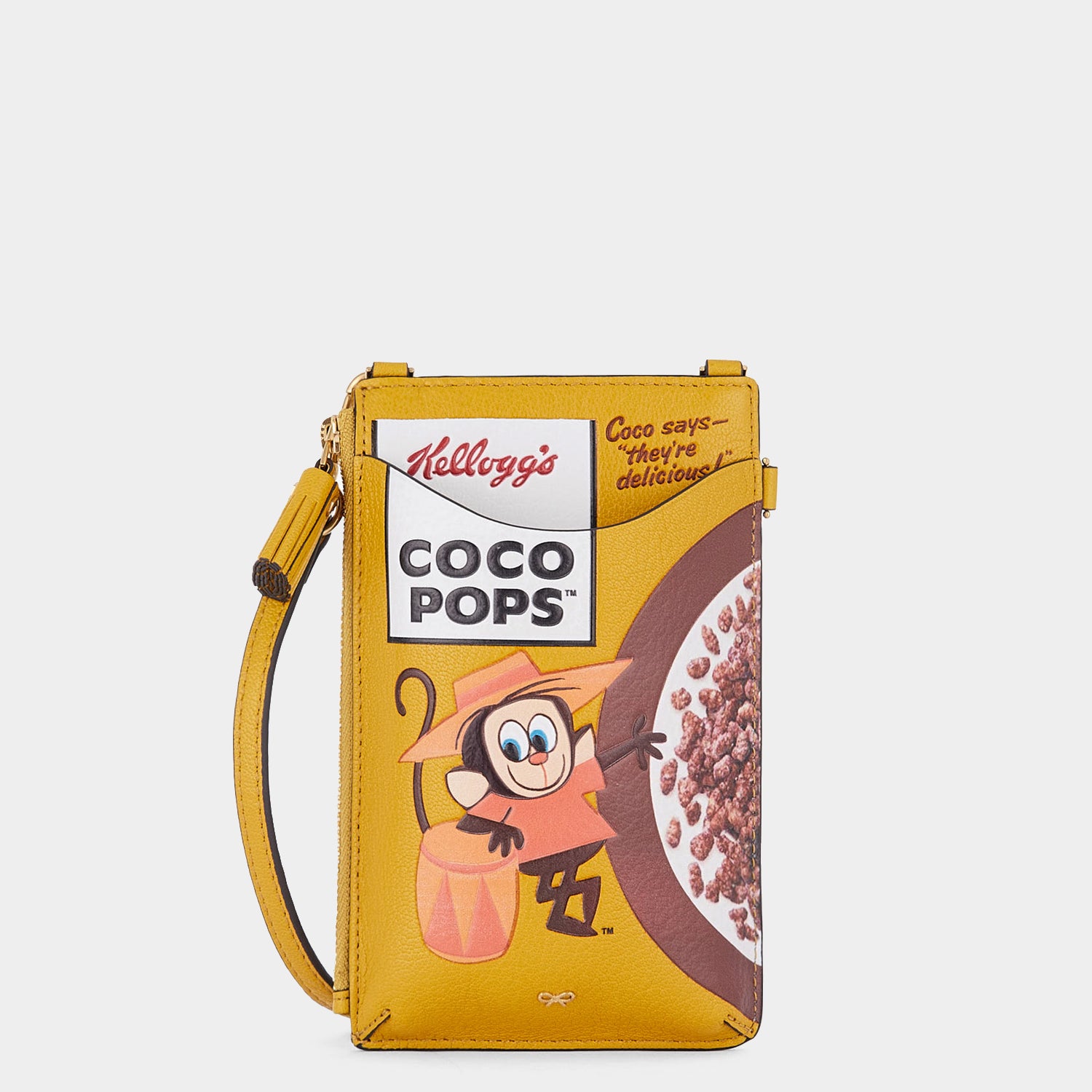 Anya Brands Coco Pops Zip Phone Pouch on Strap -

                  
                    Shiny Capra Leather in Mustard -
                  

                  Anya Hindmarch UK
