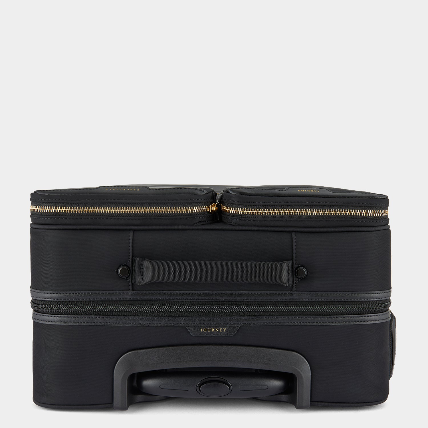 Short-Haul Suitcase -

                  
                    Econyl® Regenerated Nylon in Black -
                  

                  Anya Hindmarch UK
