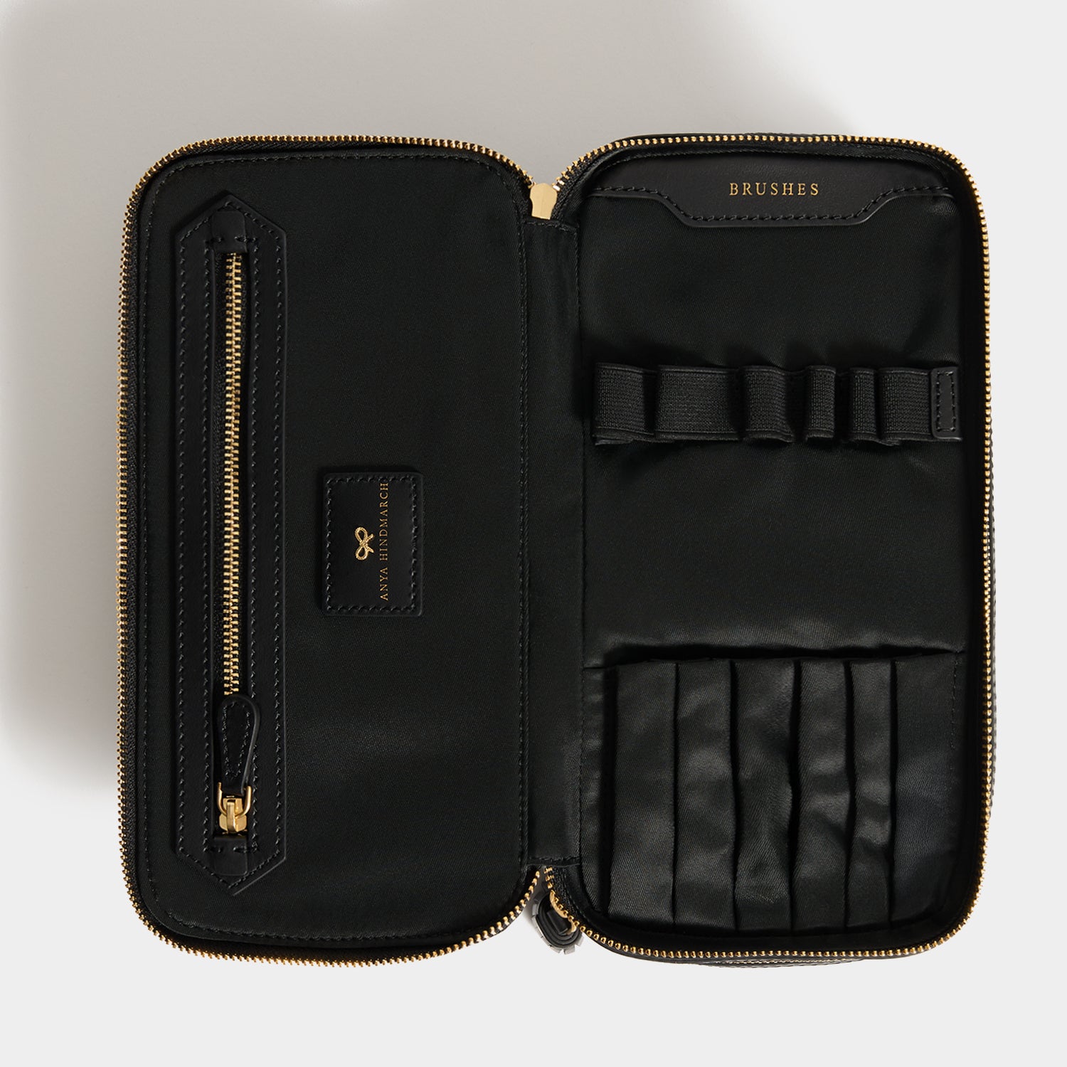 Logo Make-Up Pouch -

          
            Jacquard Nylon in Black -
          

          Anya Hindmarch UK
