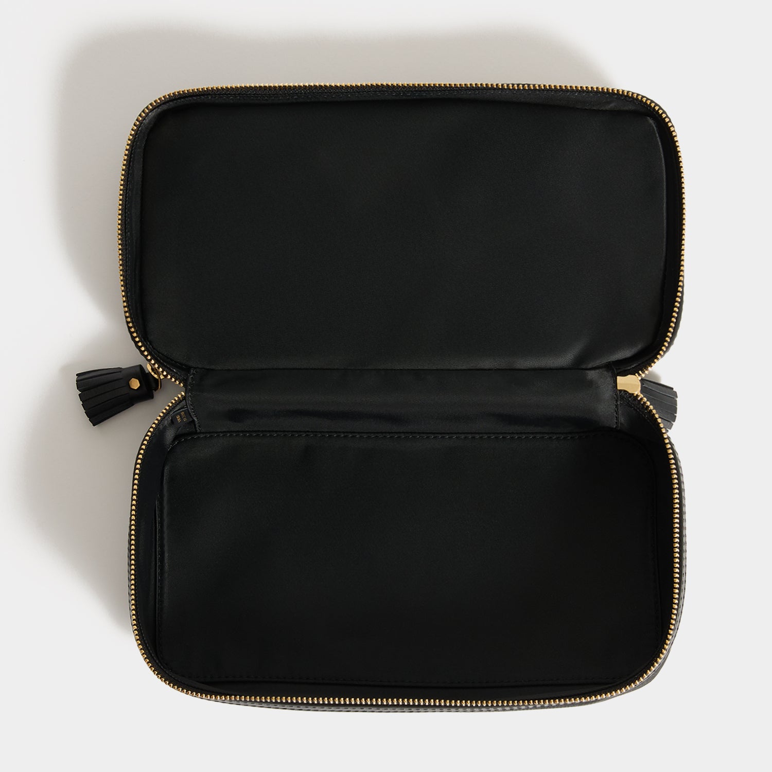Logo Make-Up Pouch -

          
            Jacquard Nylon in Black -
          

          Anya Hindmarch UK
