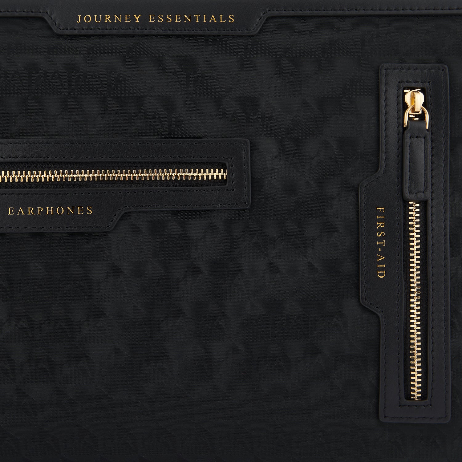 Logo Journey Essentials Pochette -

                  
                    Jacquard Nylon in Black -
                  

                  Anya Hindmarch UK
