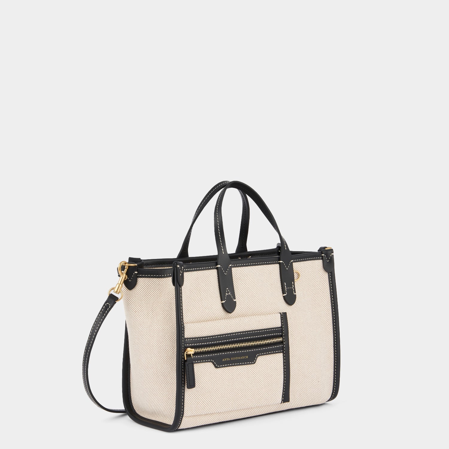 Pocket XS Cross-body Tote -

                  
                    Mixed Canvas in Natural -
                  

                  Anya Hindmarch UK
