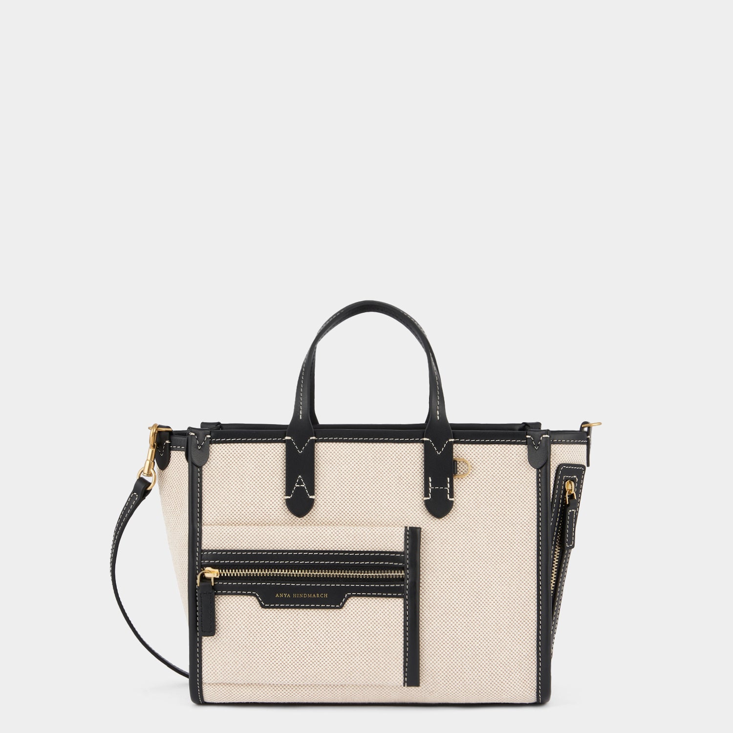 Pocket XS Cross-body Tote -

                  
                    Mixed Canvas in Natural -
                  

                  Anya Hindmarch UK
