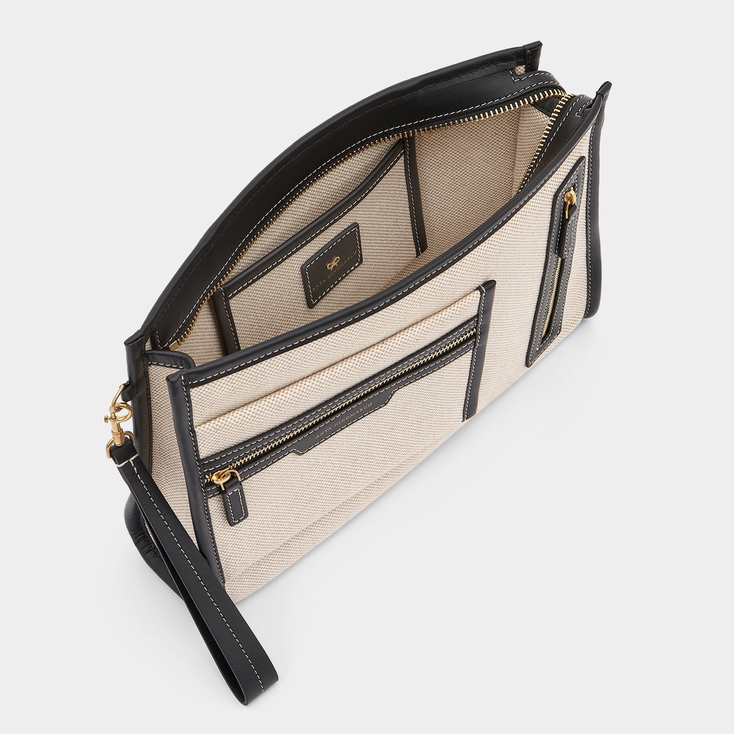 Pocket Pochette -

                  
                    Mixed Canvas in Natural -
                  

                  Anya Hindmarch UK
