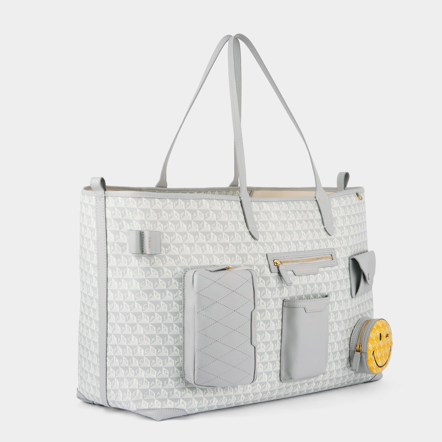 I am a Plastic Bag Wink XL Tote -

                  
                    Recycled Canvas in Frost -
                  

                  Anya Hindmarch UK
