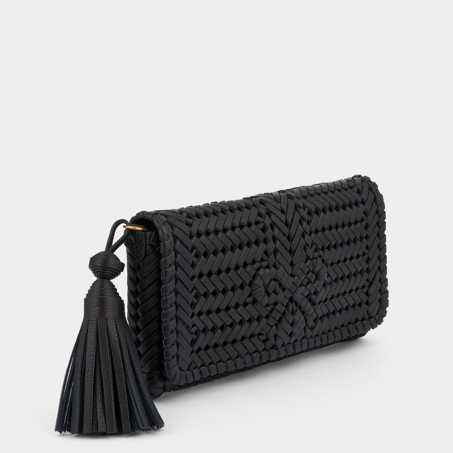 Neeson Tassel Clutch -

                  
                    Capra Leather in Black -
                  

                  Anya Hindmarch UK
