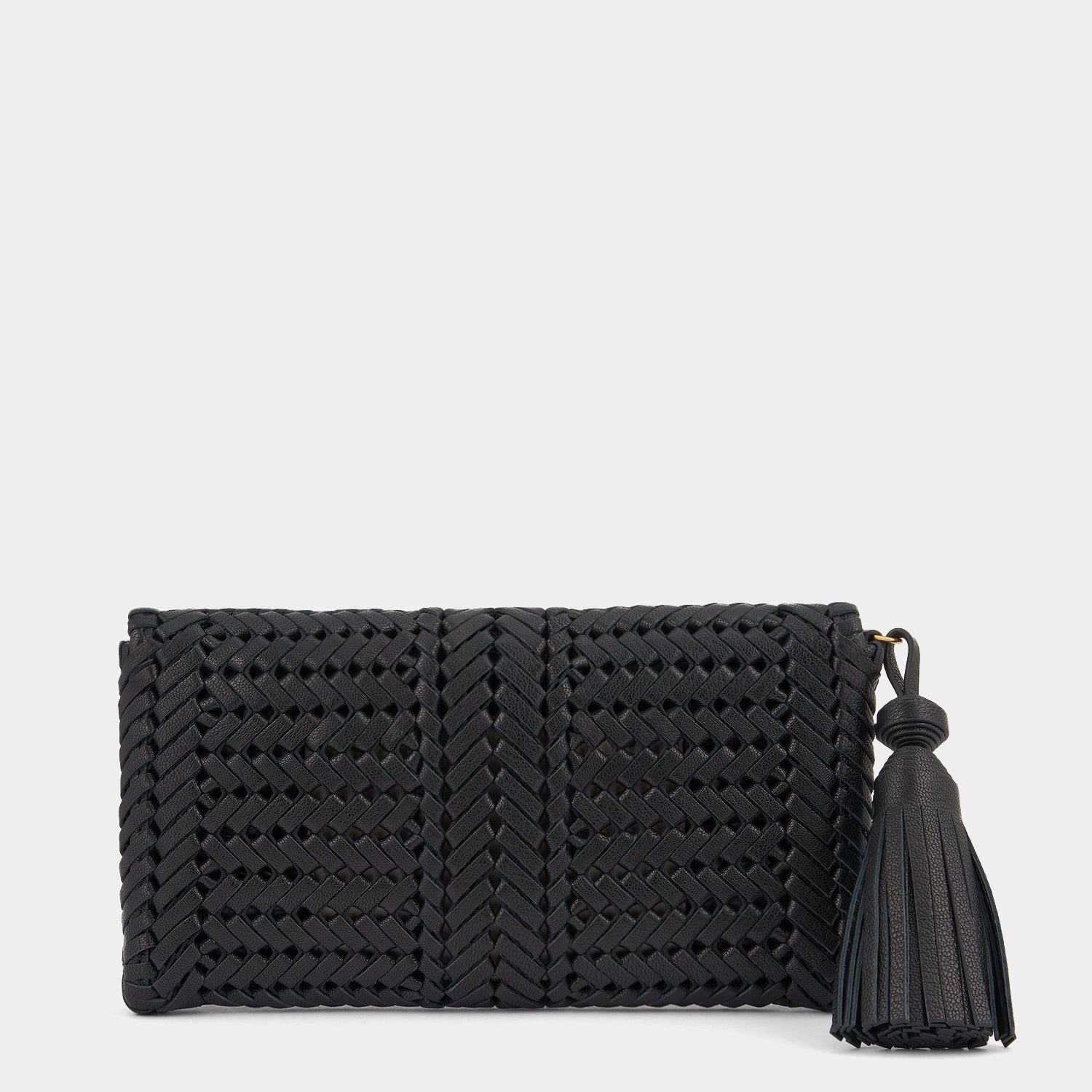 Neeson Tassel Clutch -

                  
                    Capra Leather in Black -
                  

                  Anya Hindmarch UK
