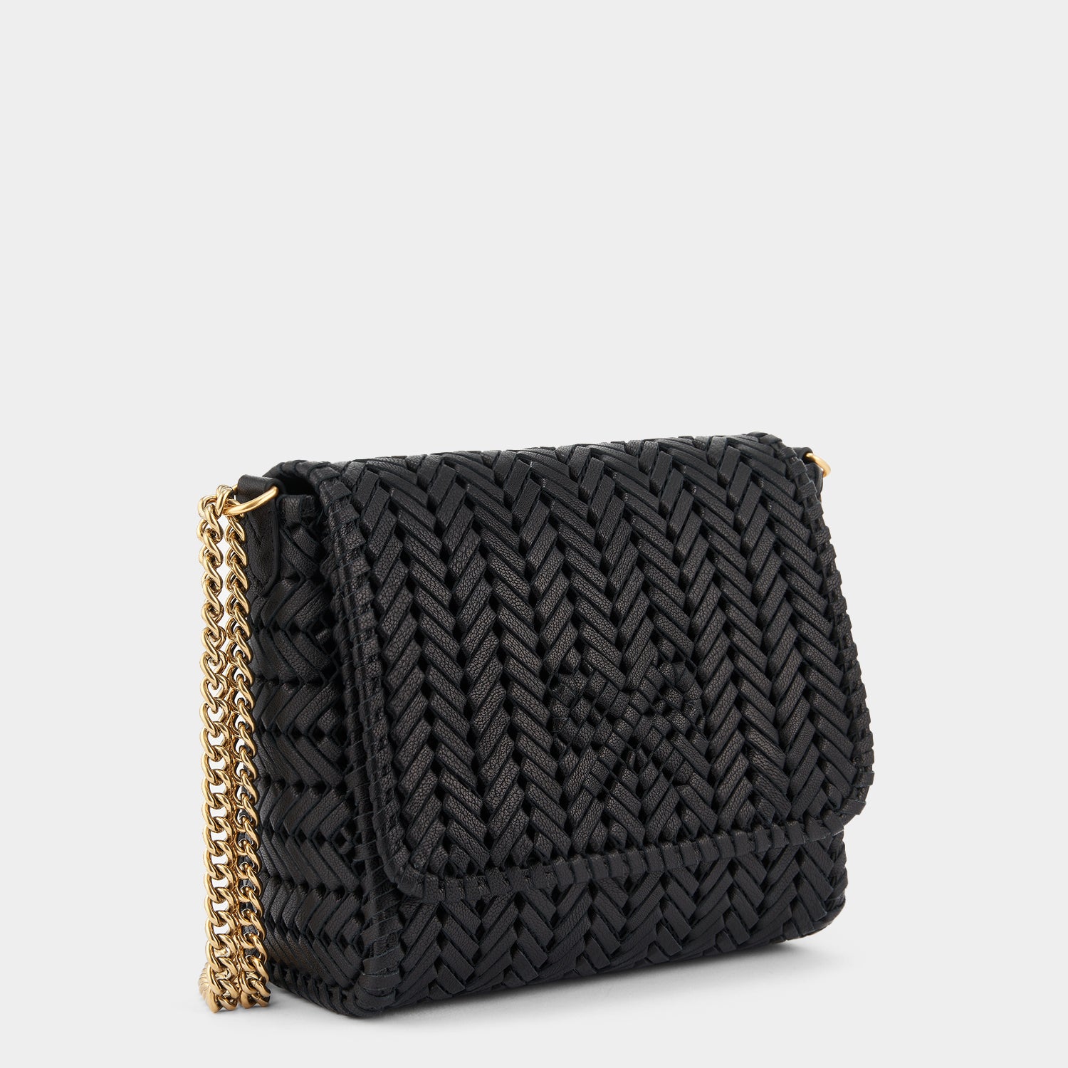 Neeson Chain Cross-body -

                  
                    Capra Leather in Black -
                  

                  Anya Hindmarch UK
