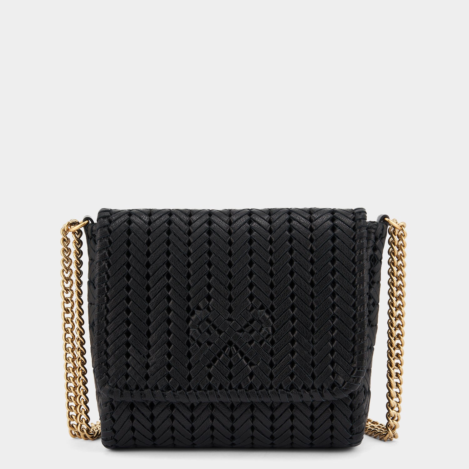 Neeson Chain Cross-body -

                  
                    Capra Leather in Black -
                  

                  Anya Hindmarch UK
