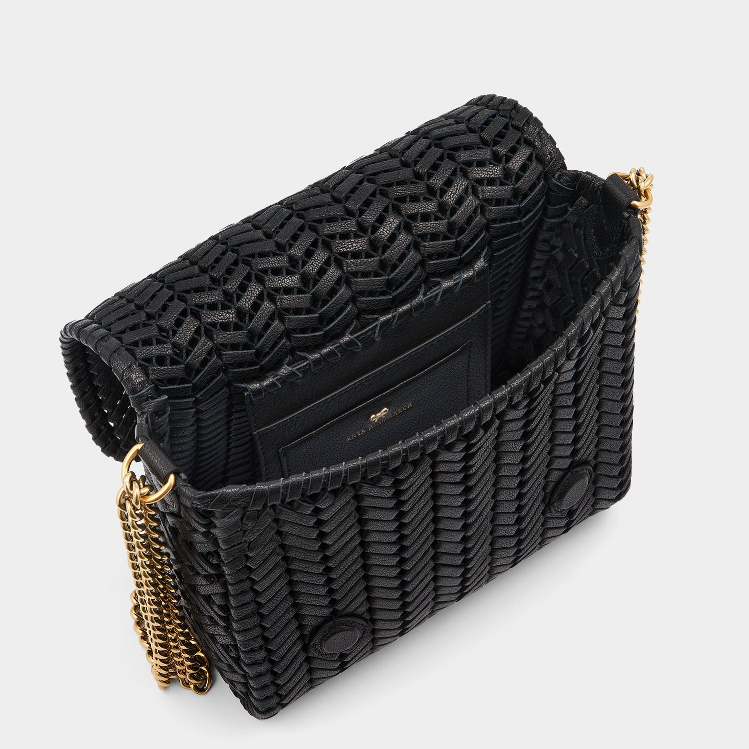 Neeson Chain Cross-body -

                  
                    Capra Leather in Black -
                  

                  Anya Hindmarch UK
