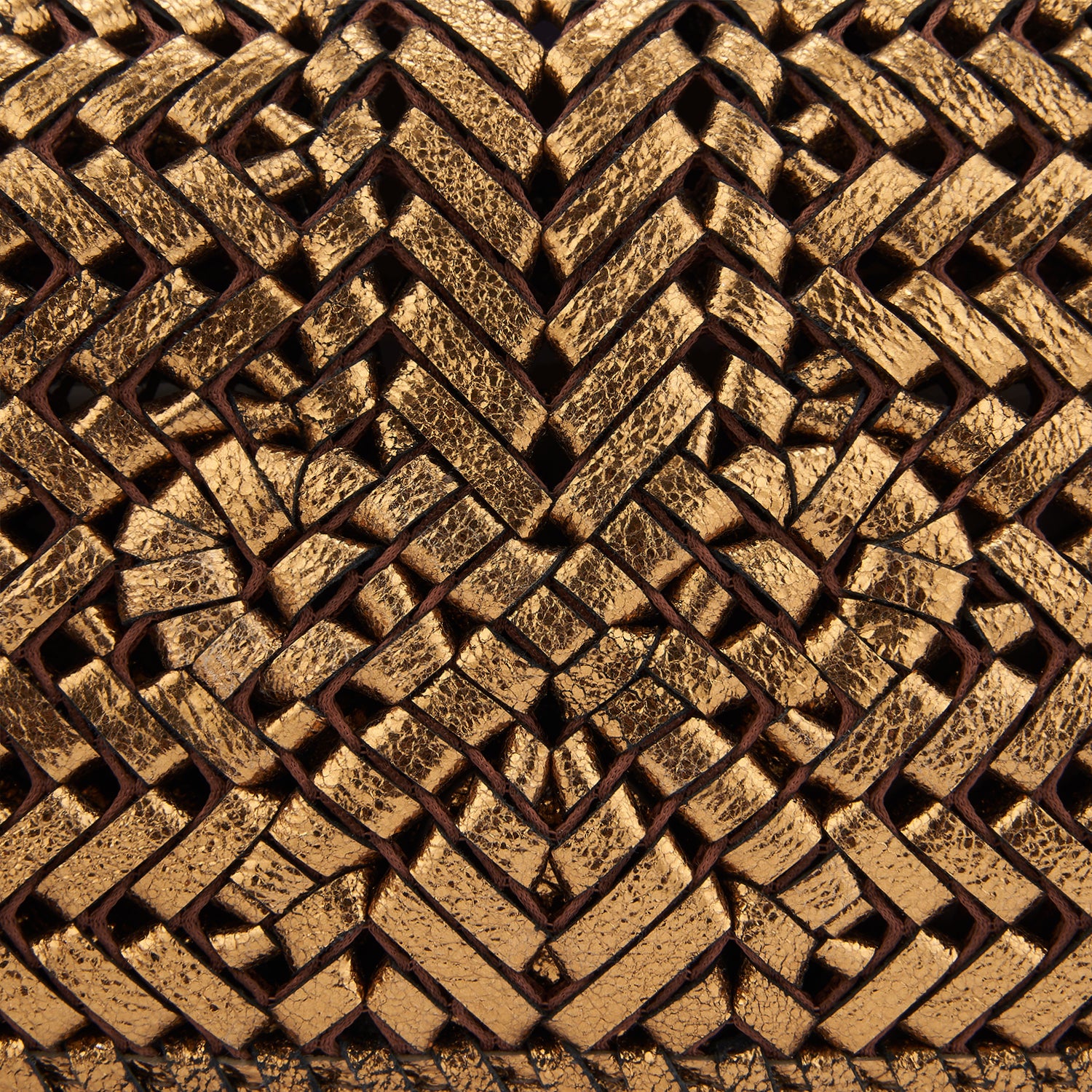 Neeson Tassel Clutch -

                  
                    Metallic Leather in Bronze -
                  

                  Anya Hindmarch UK

